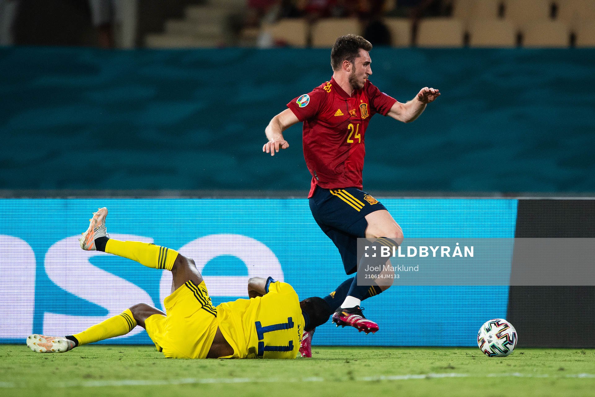 Alexander Isak of Sweden and Aymeric Laporte of Spain