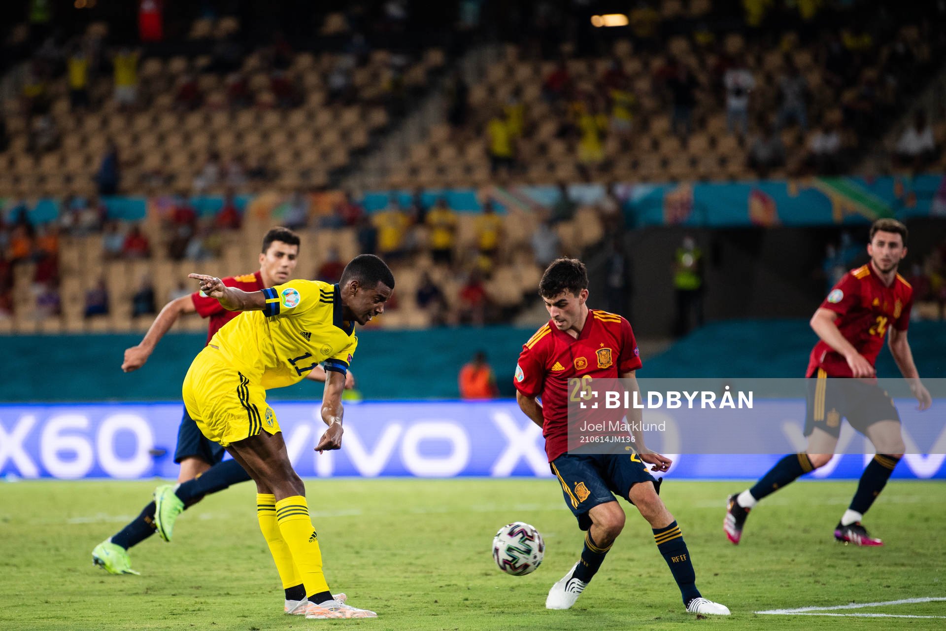 Alexander Isak of Sweden and Pedri Pedri of Spain