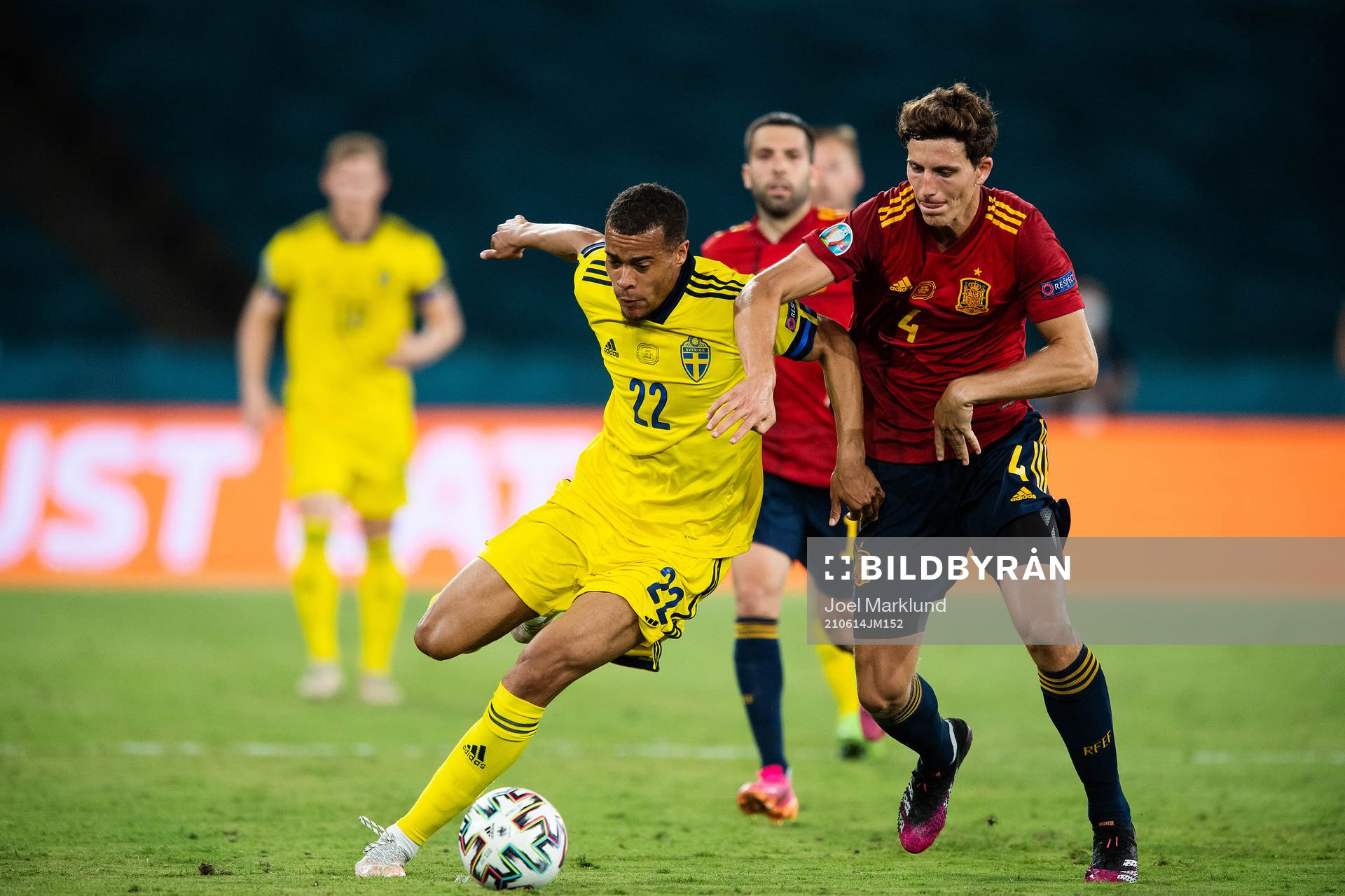 Robin Quaison of Sweden and Aymeric Laporte of Spain