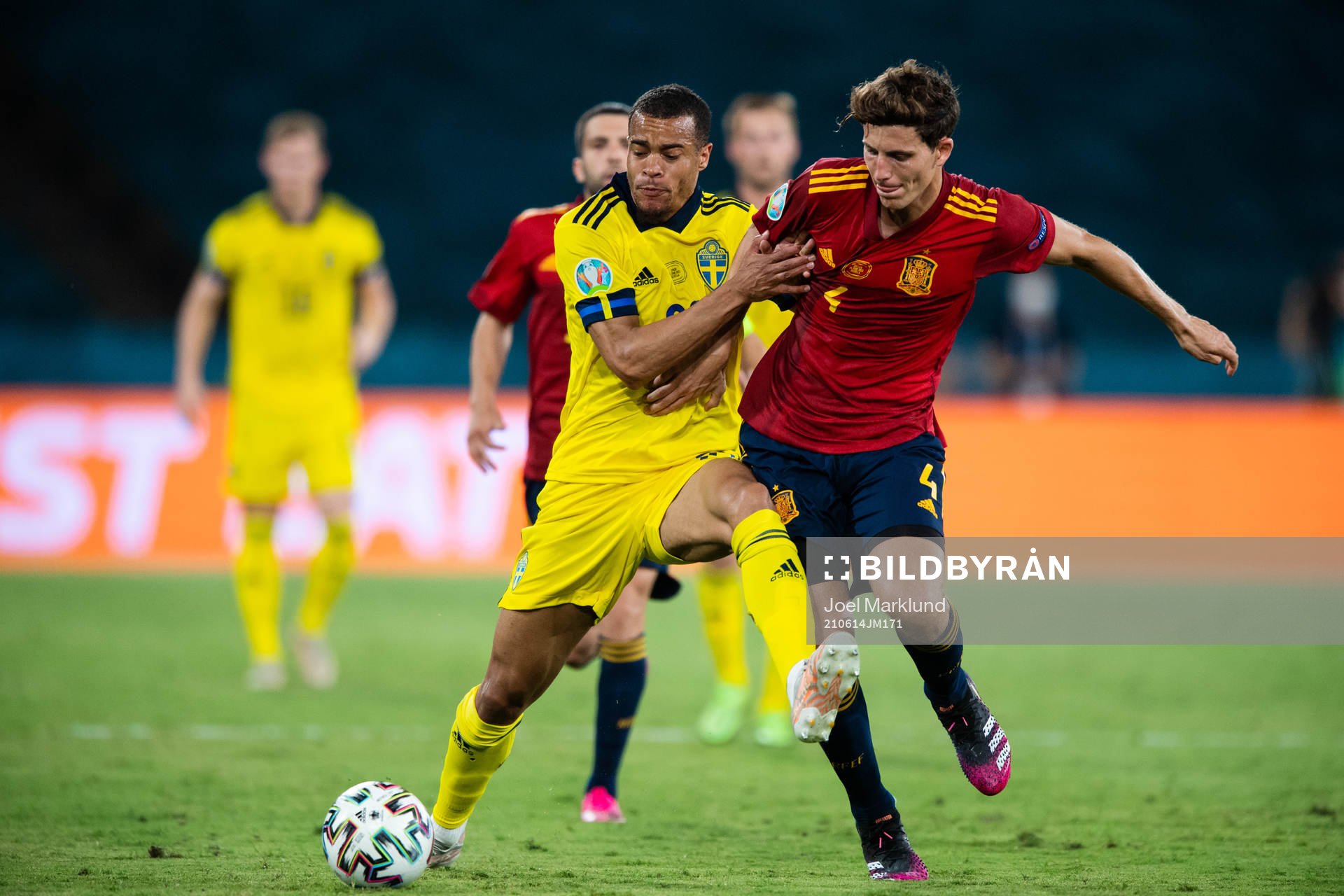 Robin Quaison of Sweden and Aymeric Laporte of Spain