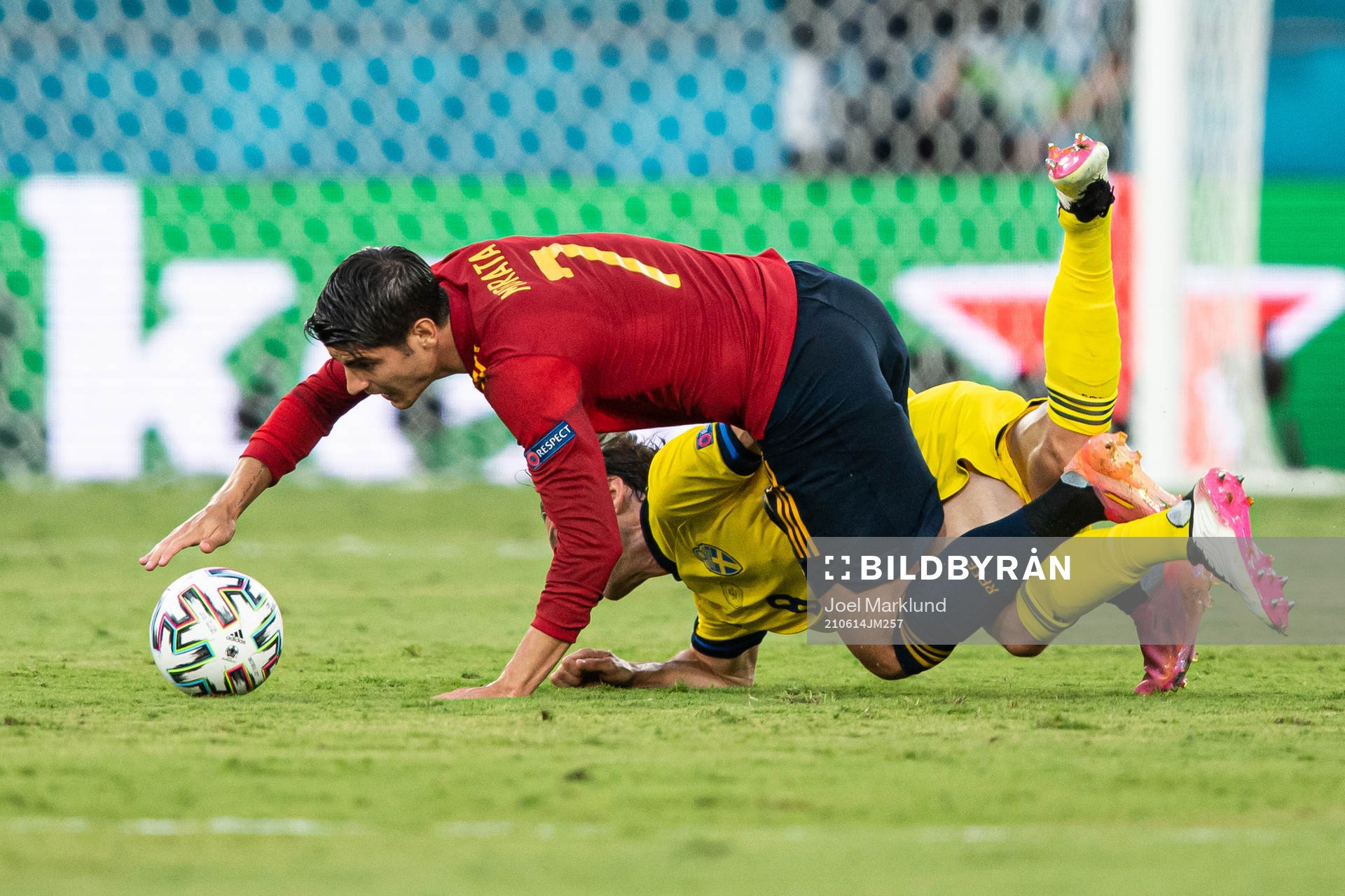 Alvaro Morata of Spain in action against Albin Ekdal of