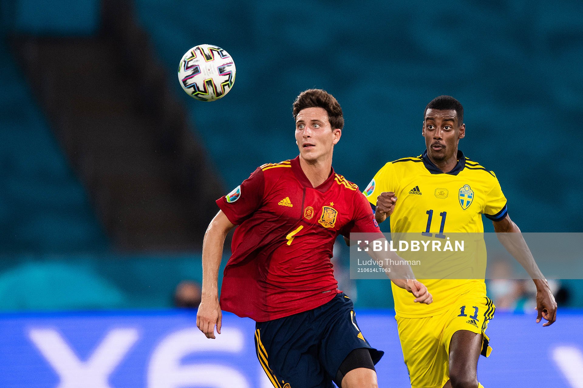 Pau Torres of Spain and Alexander Isak of Sweden