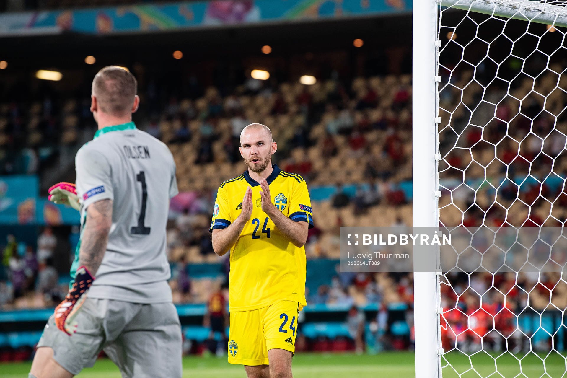 Marcus Danielson and goalkeeper Robin Olsen of Sweden