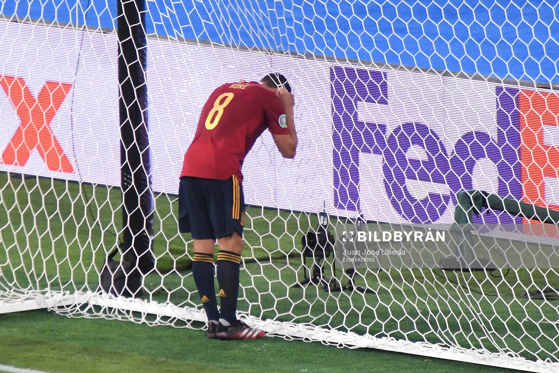 Koke Koke of Spain looks dejected
