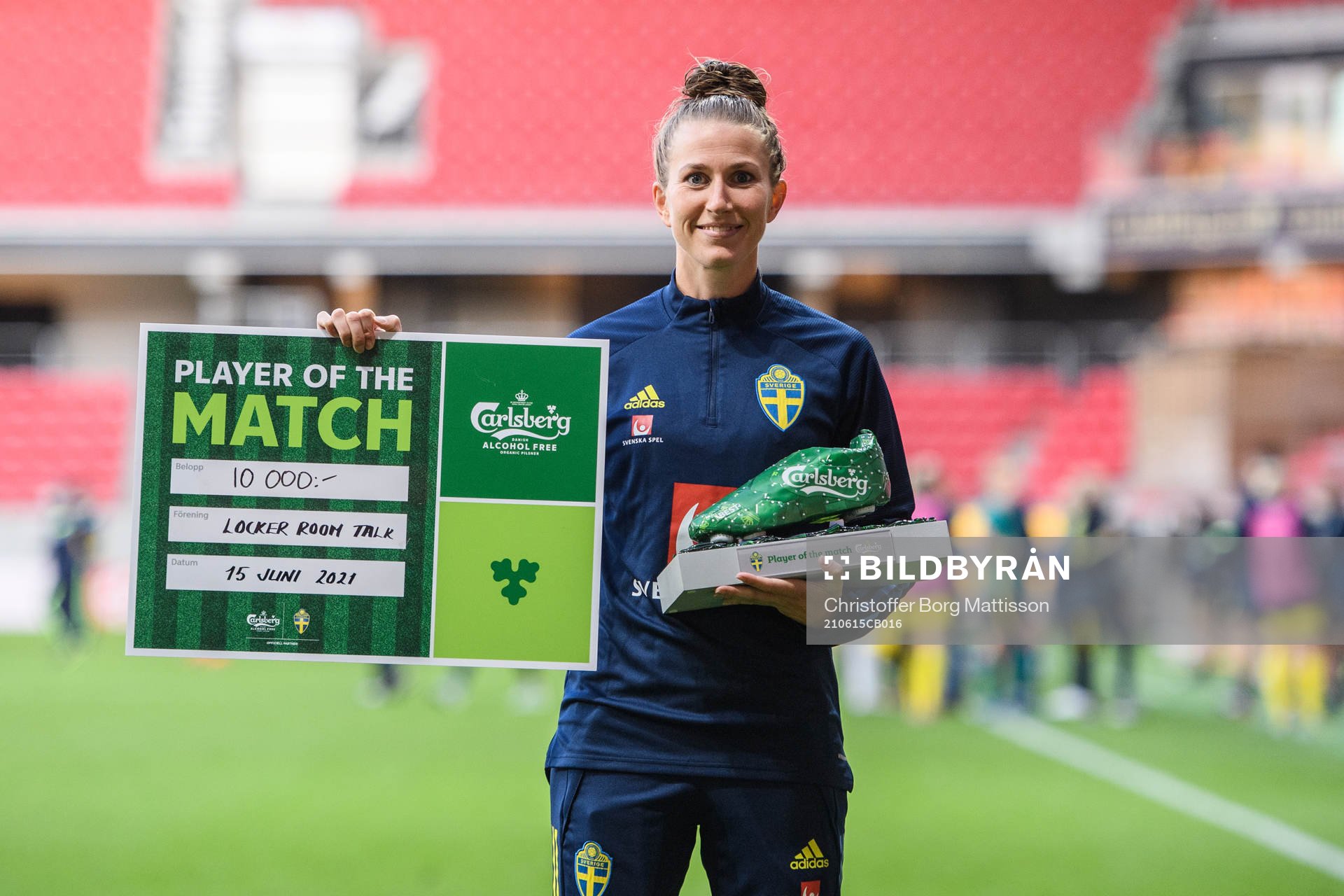 Emma Berglund of Sweden with the price as player of the
