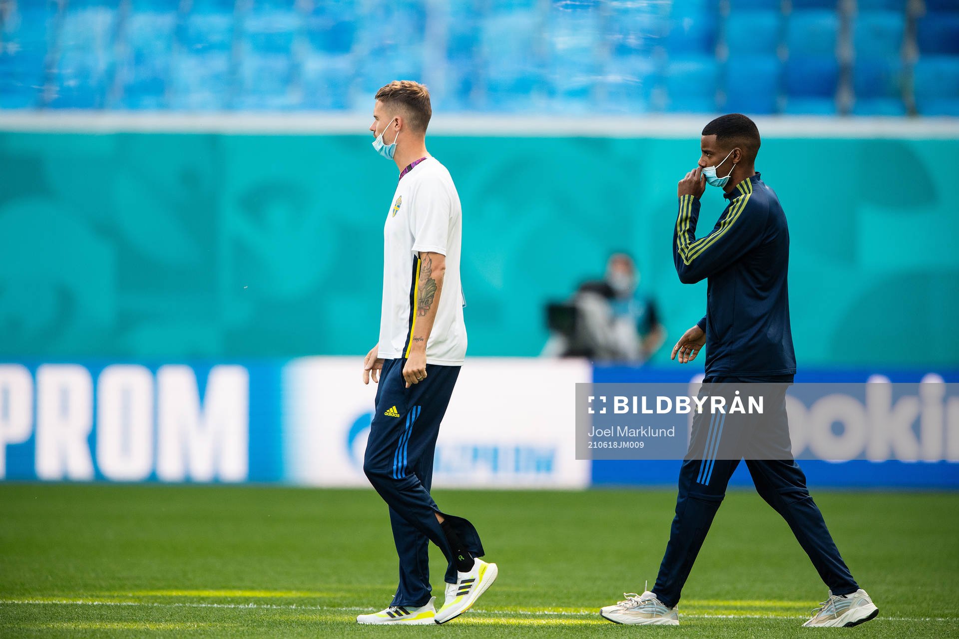 Mikael Lustig and Alexander Isak of Sweden