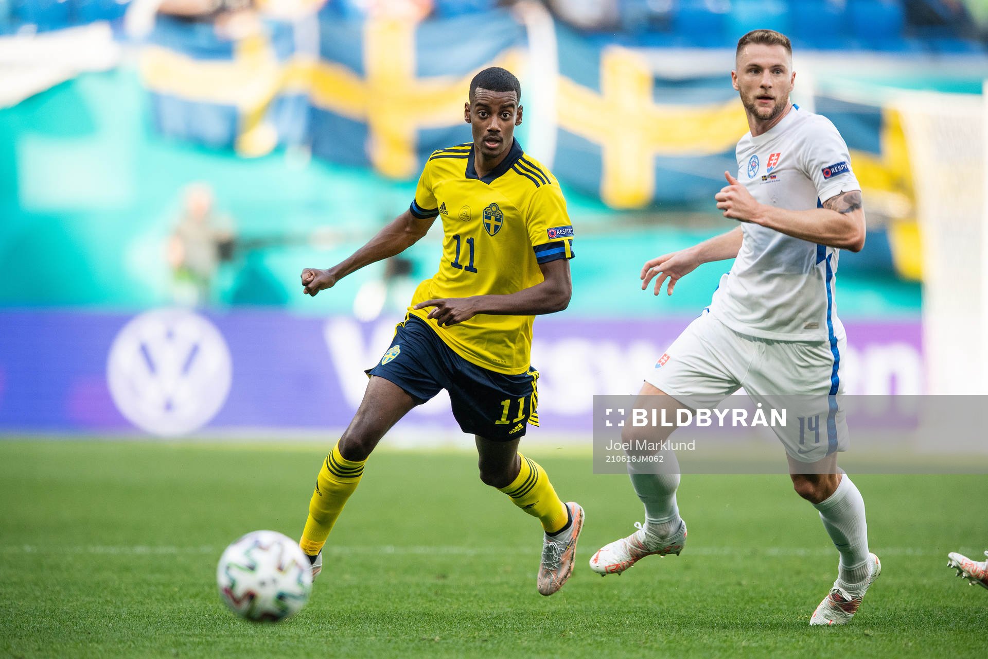 Alexander Isak of Sweden and Milan Skriniar of Slovakia