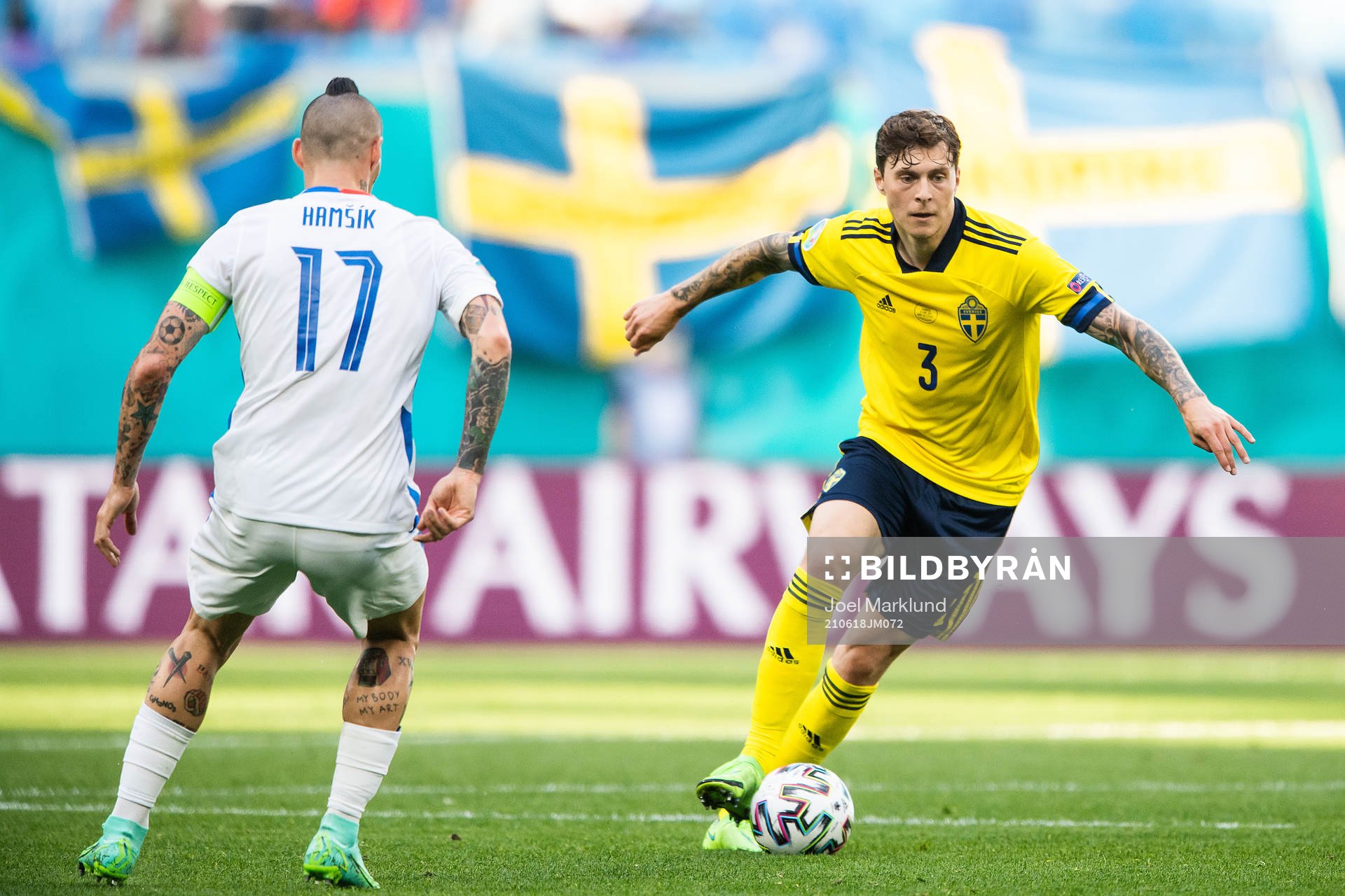 Marek Hamsik of Slovakia and Victor Nilsson Lindelöf of