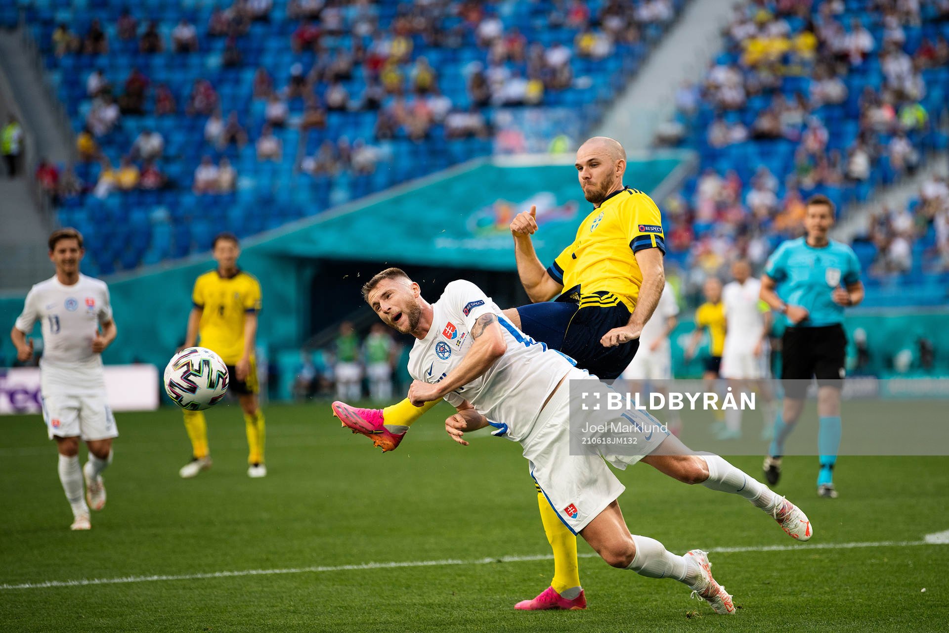 Marcus Danielson of Sweden and Milan Skriniar of Slovakia during the UEFA Euro 2020 Football Championship match between Sweden and Slovakia on June 18, 2021 in Saint Petersburg.