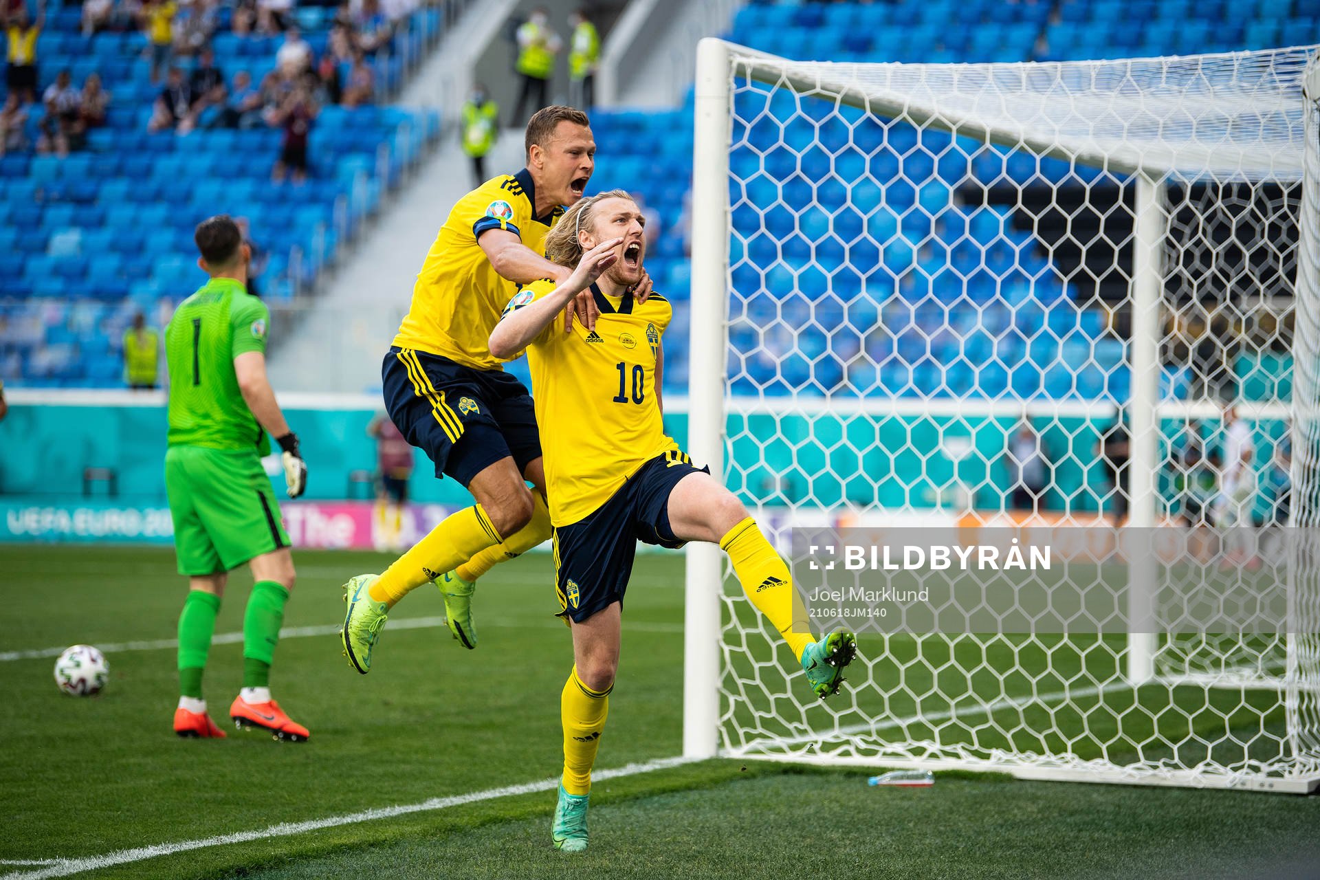 Viktor Claesson and Emil Forsberg of Sweden celebrate