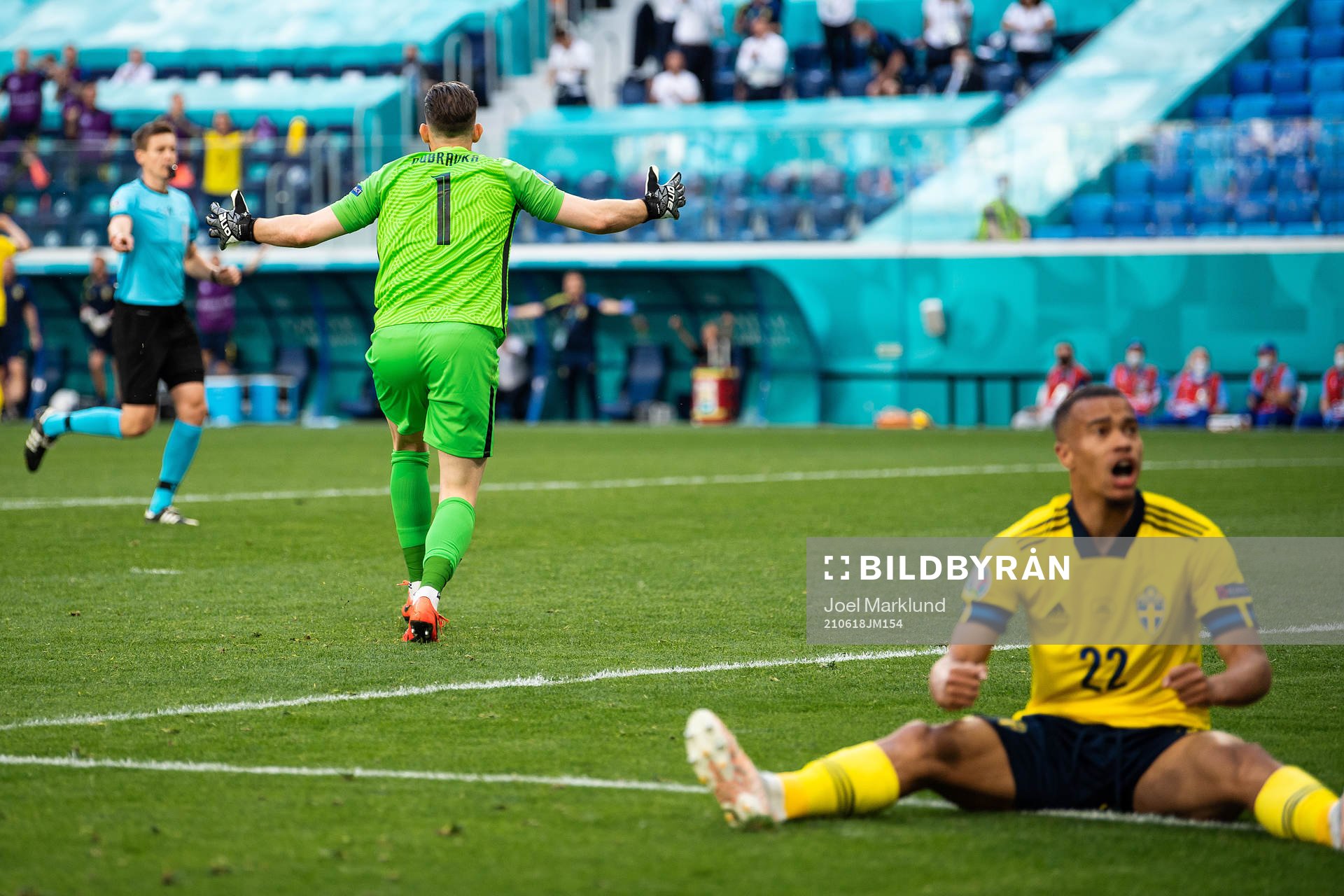 goalkeeper Martin Dubravka of Slovakia and Robin Quaison of