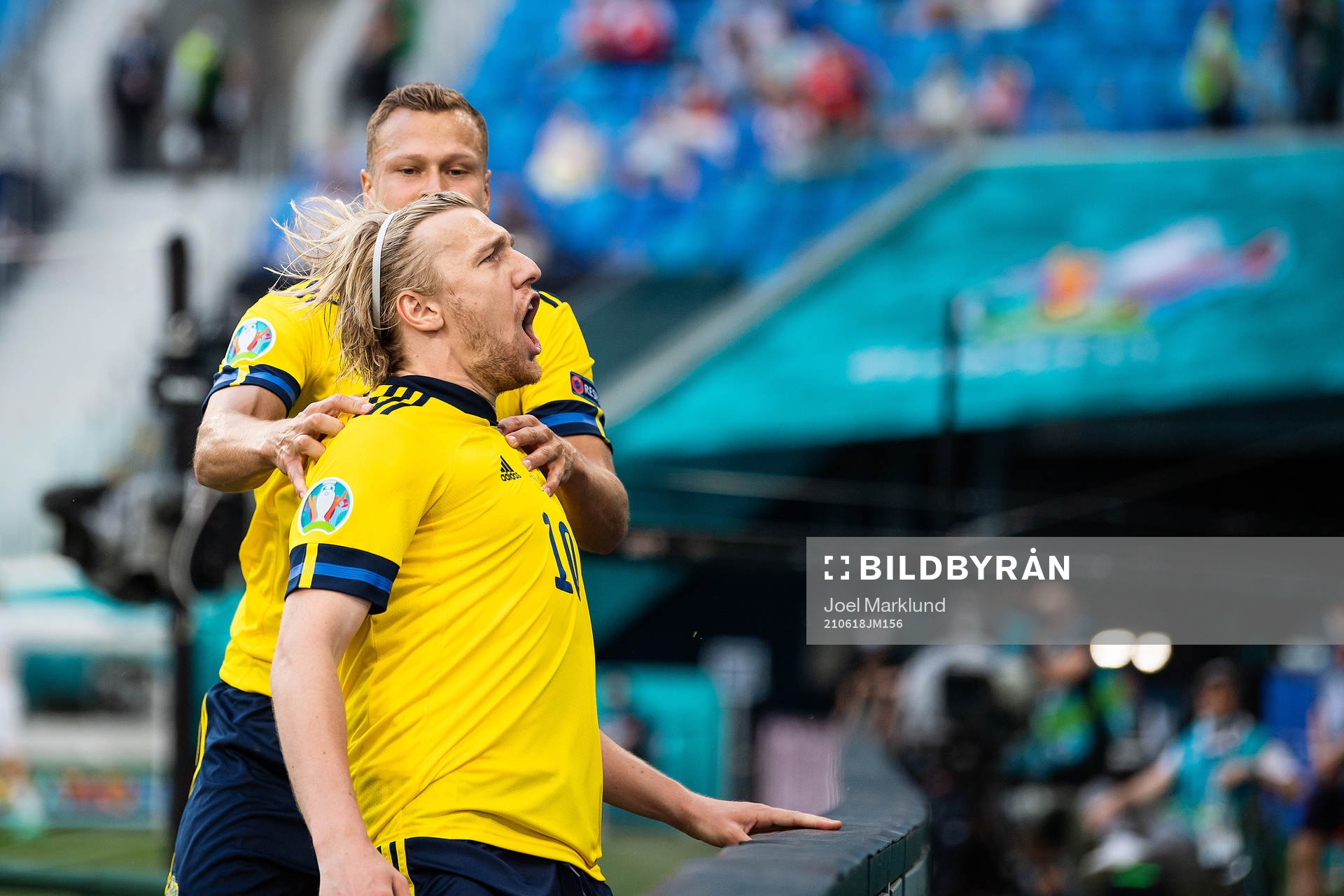 Viktor Claesson and Emil Forsberg of Sweden celebrate
