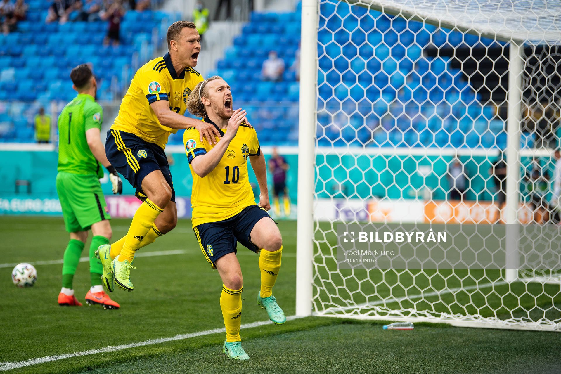 Viktor Claesson and Emil Forsberg of Sweden celebrate