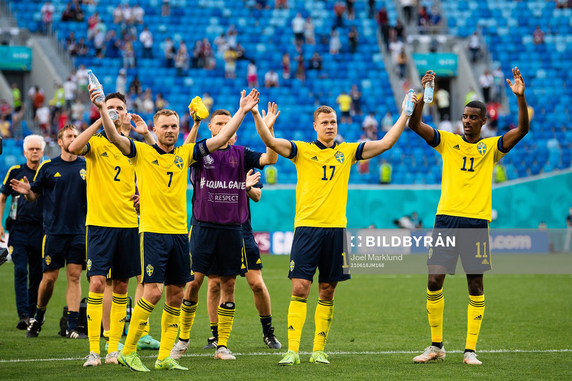 Mikael Lustig, Sebastian Larsson, Marcus Berg, Viktor Claesson and Alexander Isak of Sweden celebrate after the UEFA Euro 2020 Football Championship match between Sweden and Slovakia on June 18, 2021 in Saint Petersburg.