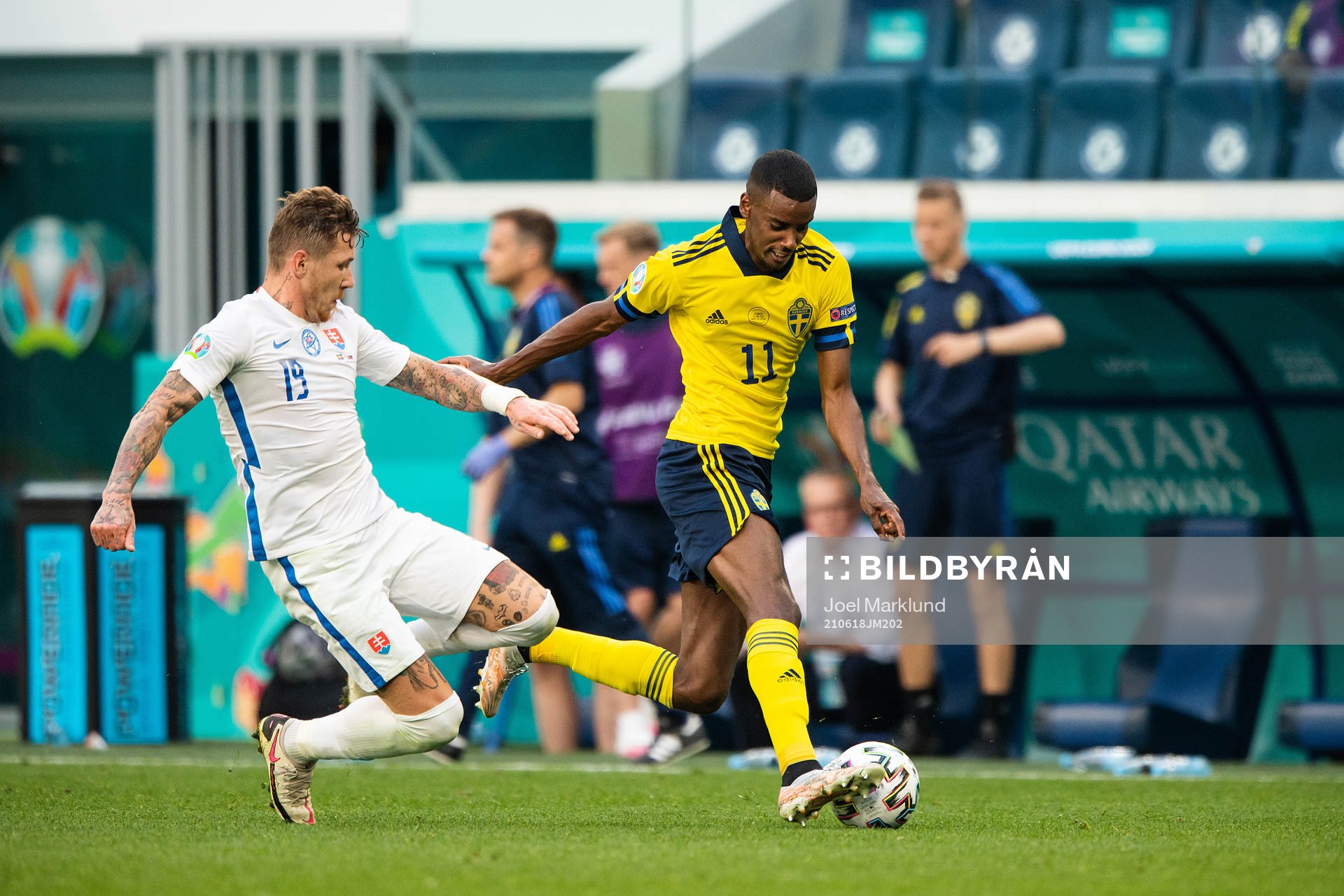 Juraj Kucka of Slovakia and Alexander Isak of Sweden