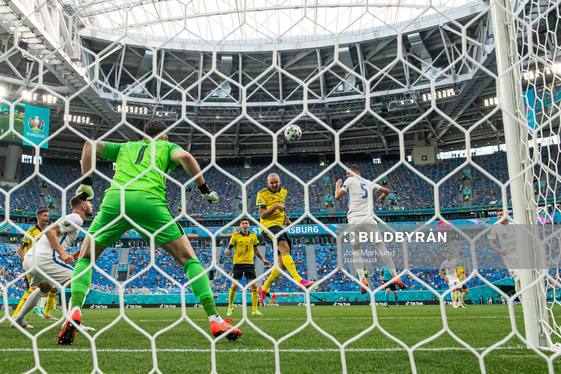 Marcus Danielson of Sweden with a header towards goalkeeper