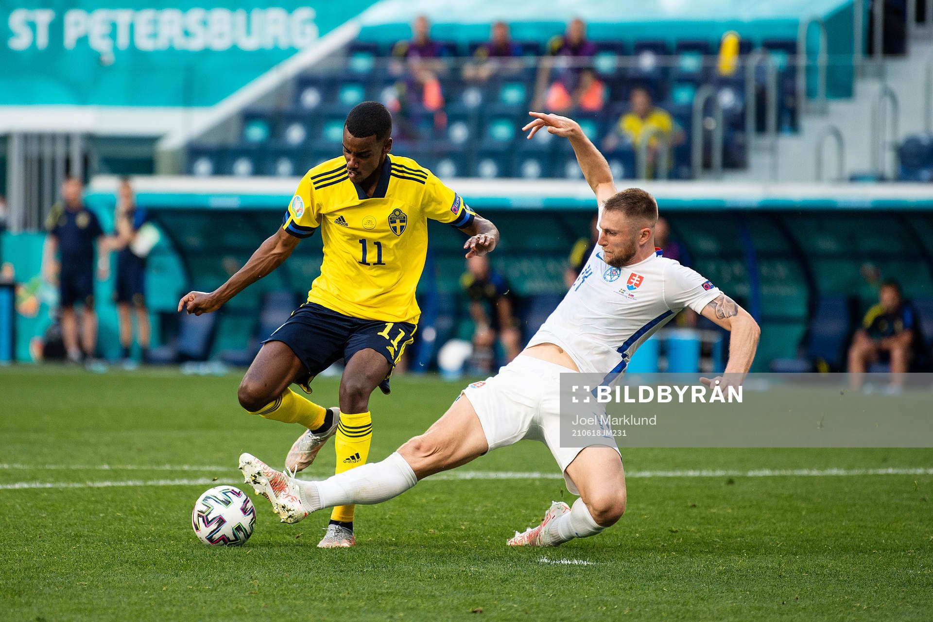 Alexander Isak of Sweden and Milan Skriniar of Slovakia