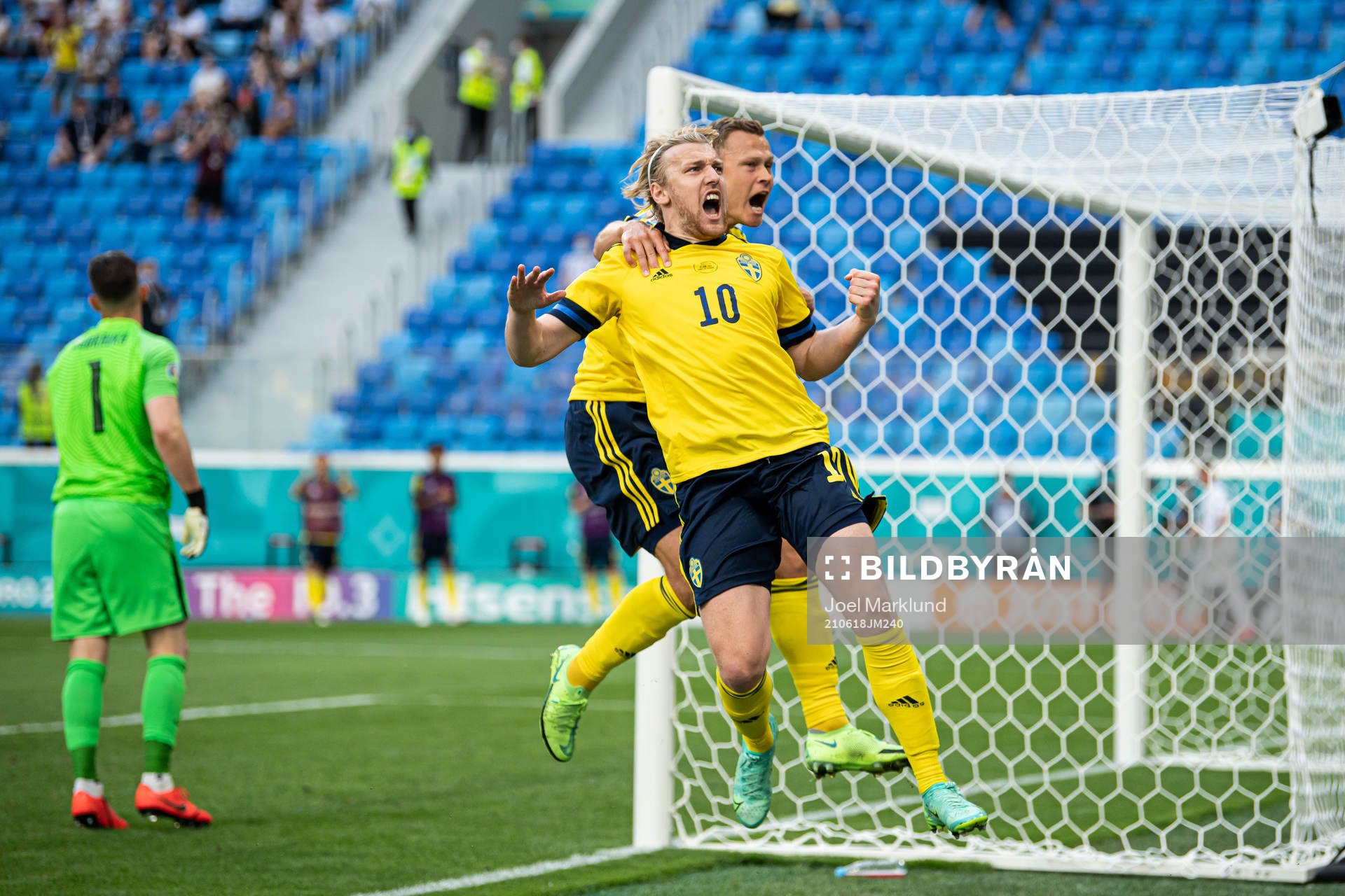Emil Forsberg and Viktor Claesson of Sweden celebrate the