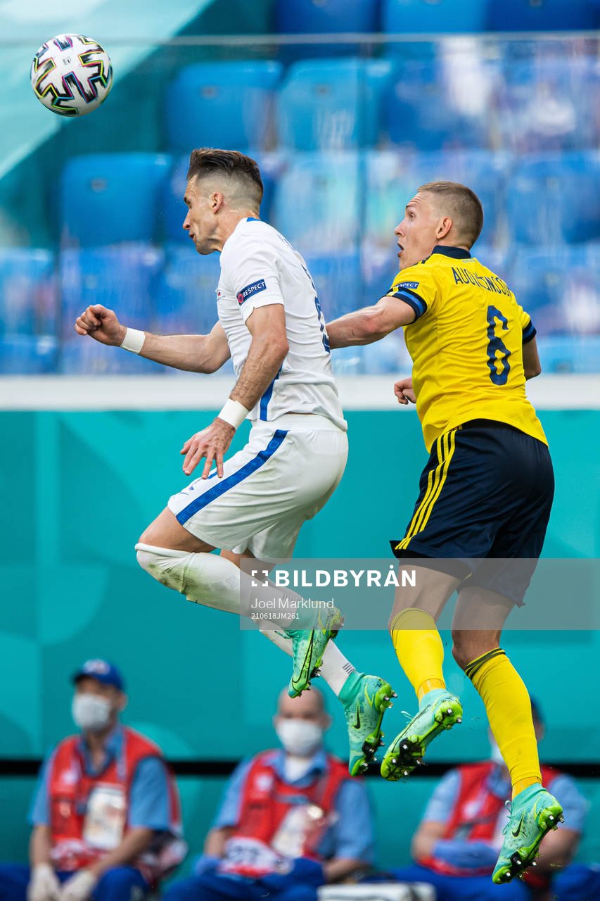 Peter Pekarik of Slovakia and Ludwig Augustinsson of Sweden