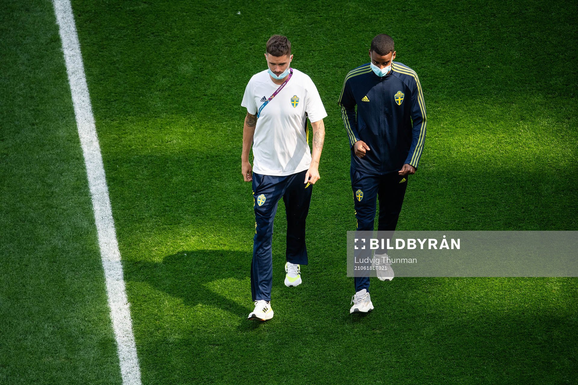 Mikael Lustig and Alexander Isak of Sweden
