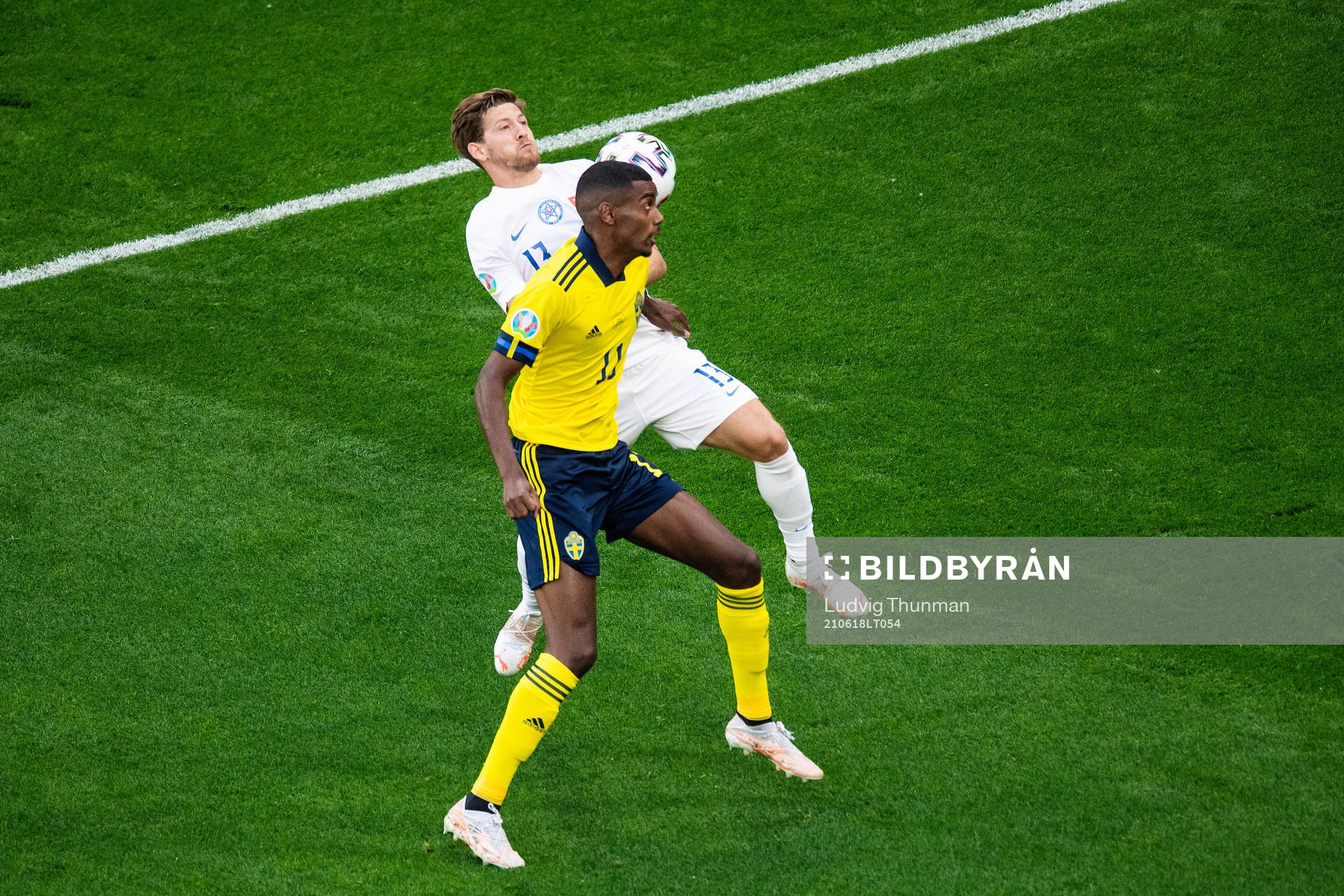 Alexander Isak of Sweden and Patrik Hrosovsky of Slovakia