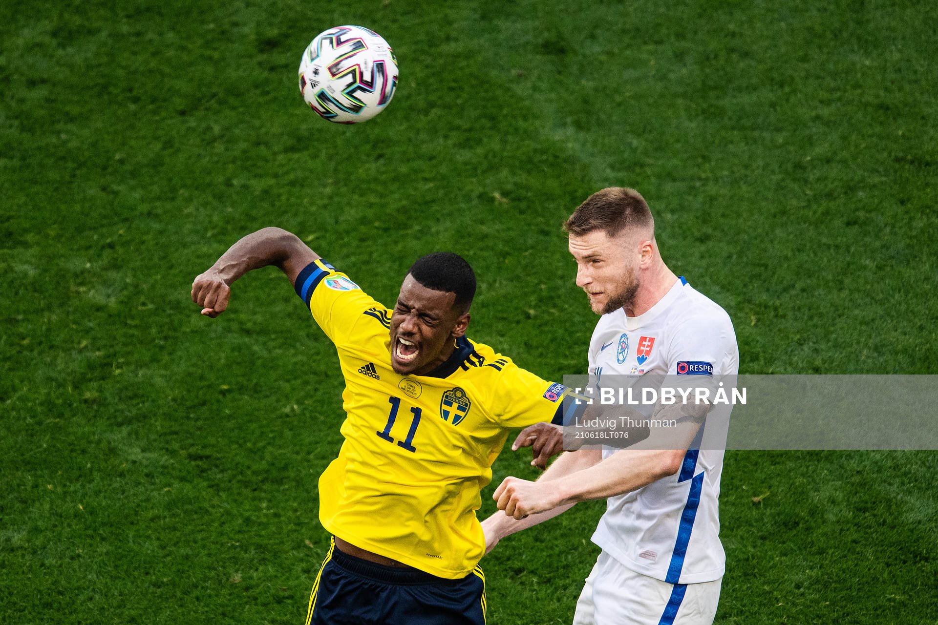 Alexander Isak of Sweden and Milan Skriniar of Slovakia