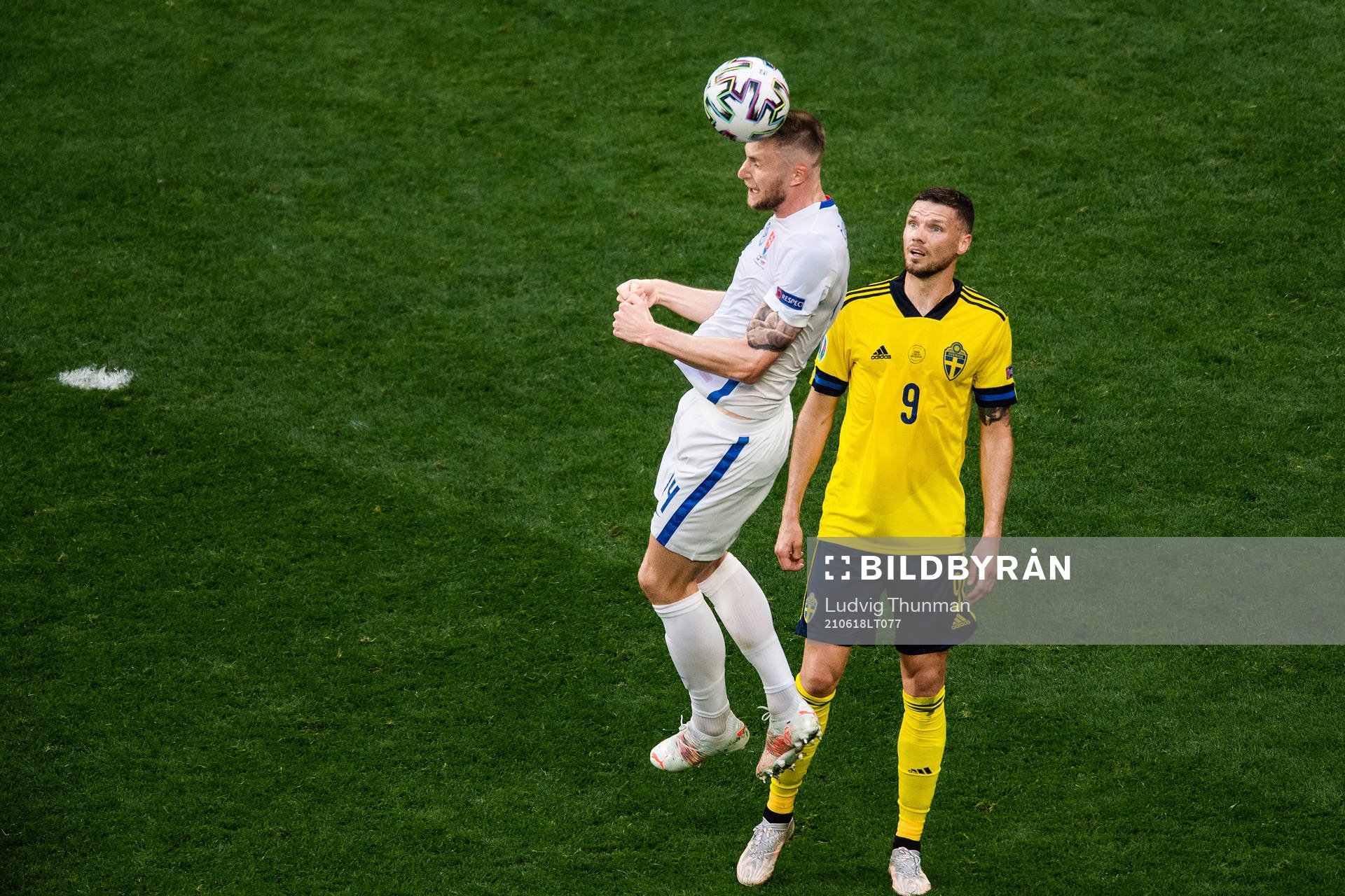 Milan Skriniar of Slovakia and Marcus Berg of Sweden during the UEFA Euro 2020 Football Championship match between Sweden and Slovakia on June 18, 2021 in Saint Petersburg.