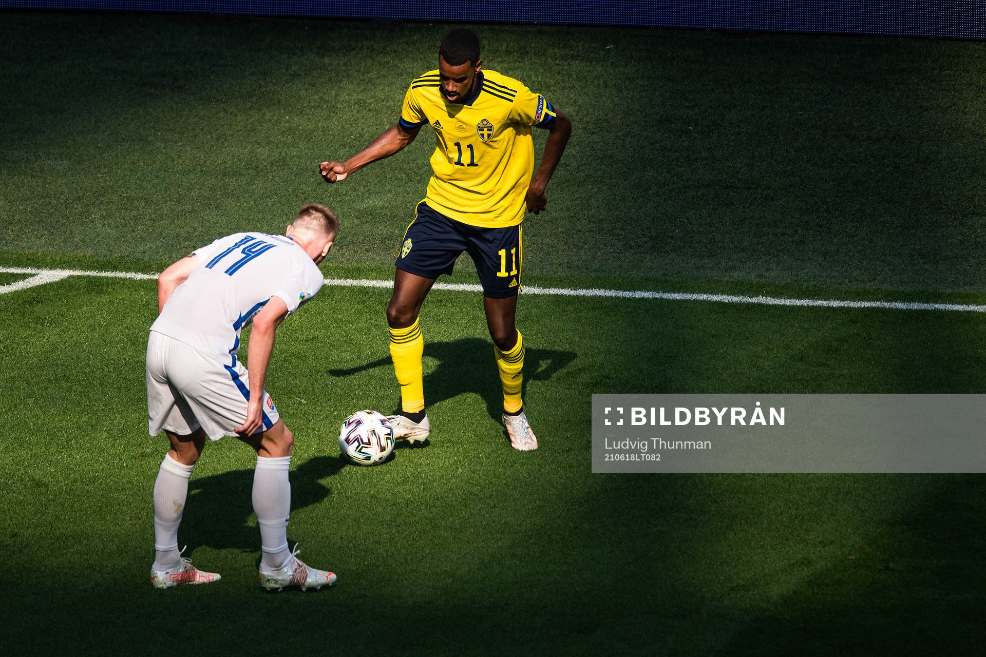 Alexander Isak of Sweden and Milan Skriniar of Slovakia