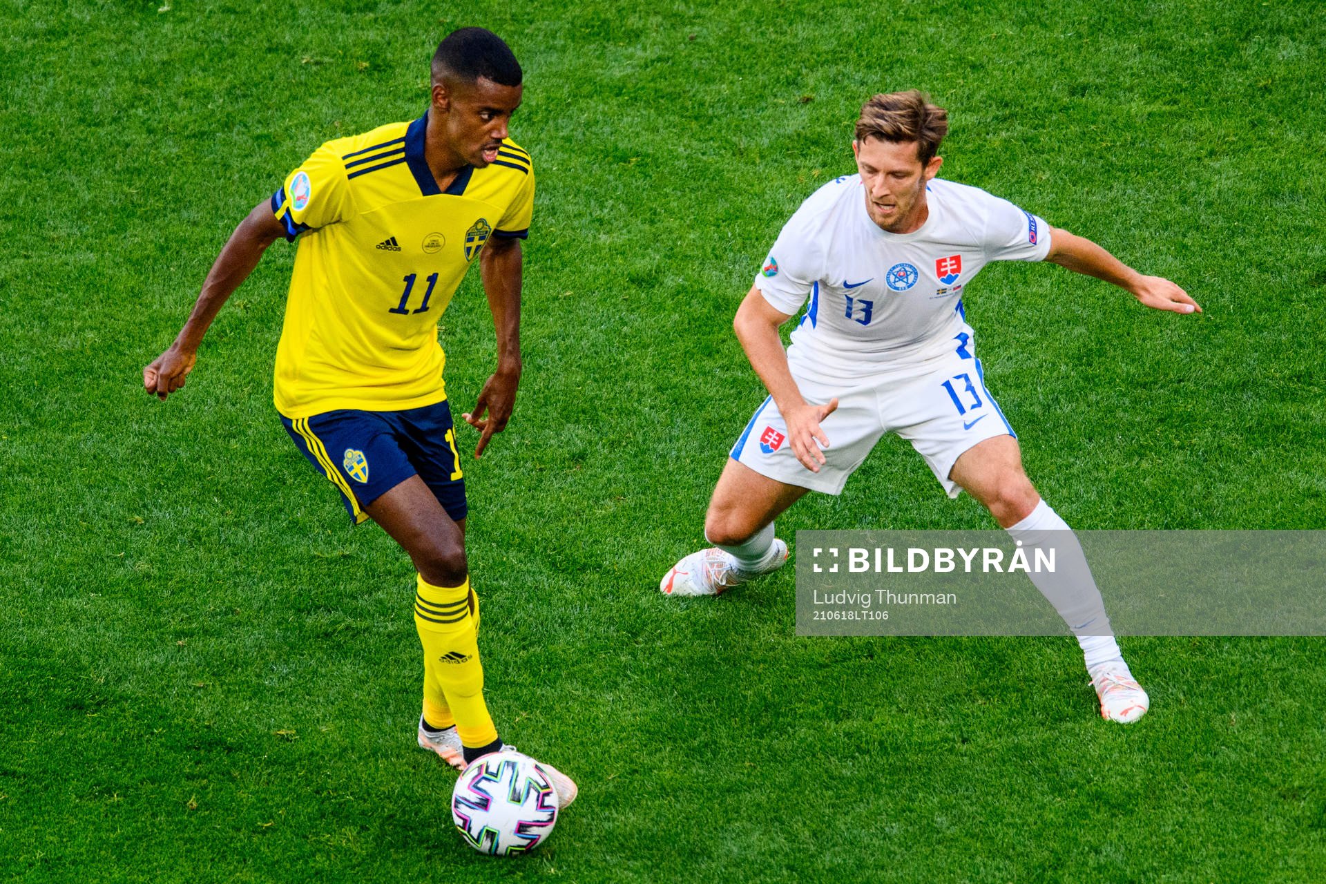 Alexander Isak of Sweden and Patrik Hrosovsky of Slovakia