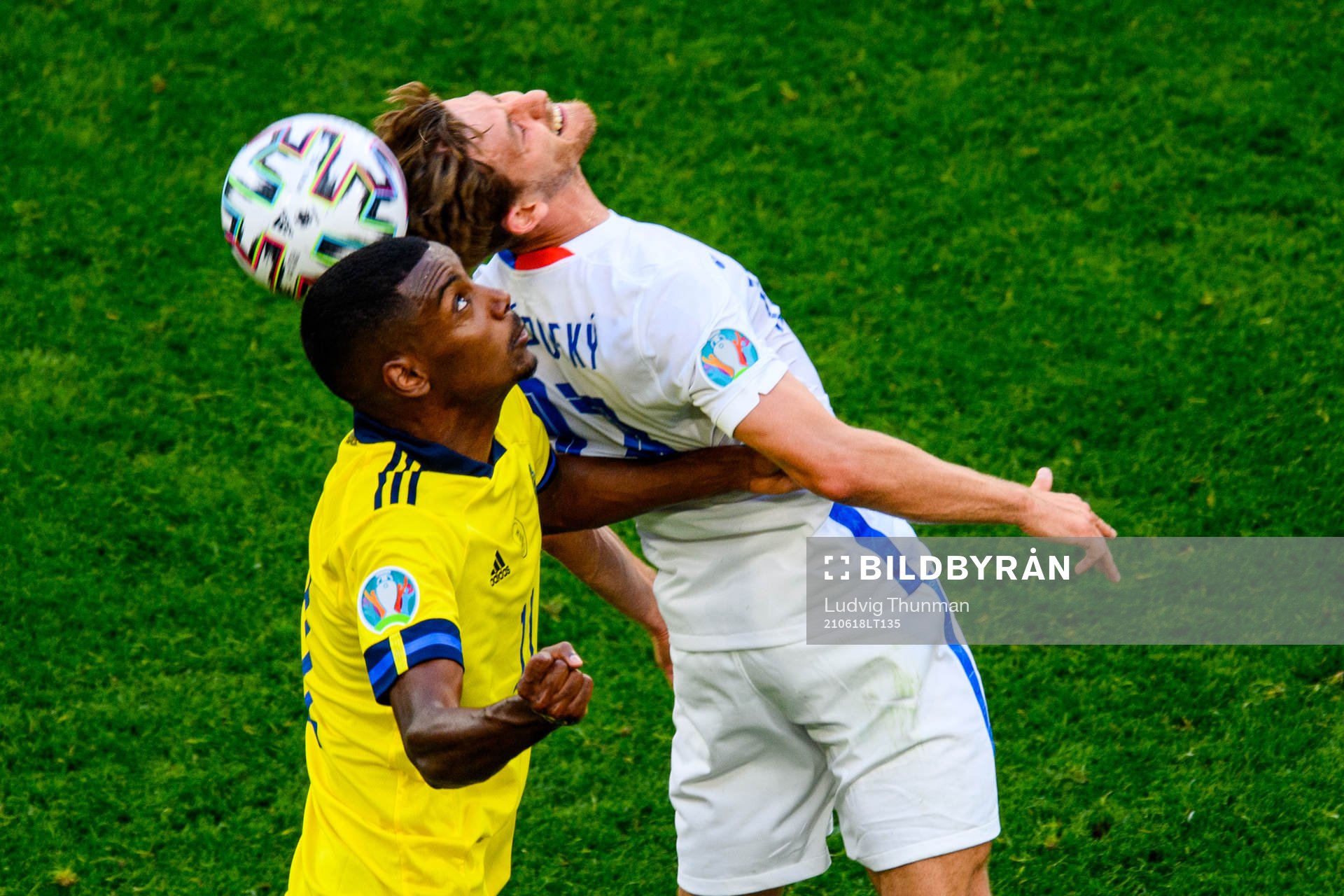 Alexander Isak of Sweden and Patrik Hrosovsky of Slovakia