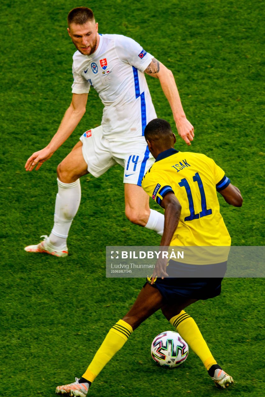 Alexander Isak of Sweden and Milan Skriniar of Slovakia