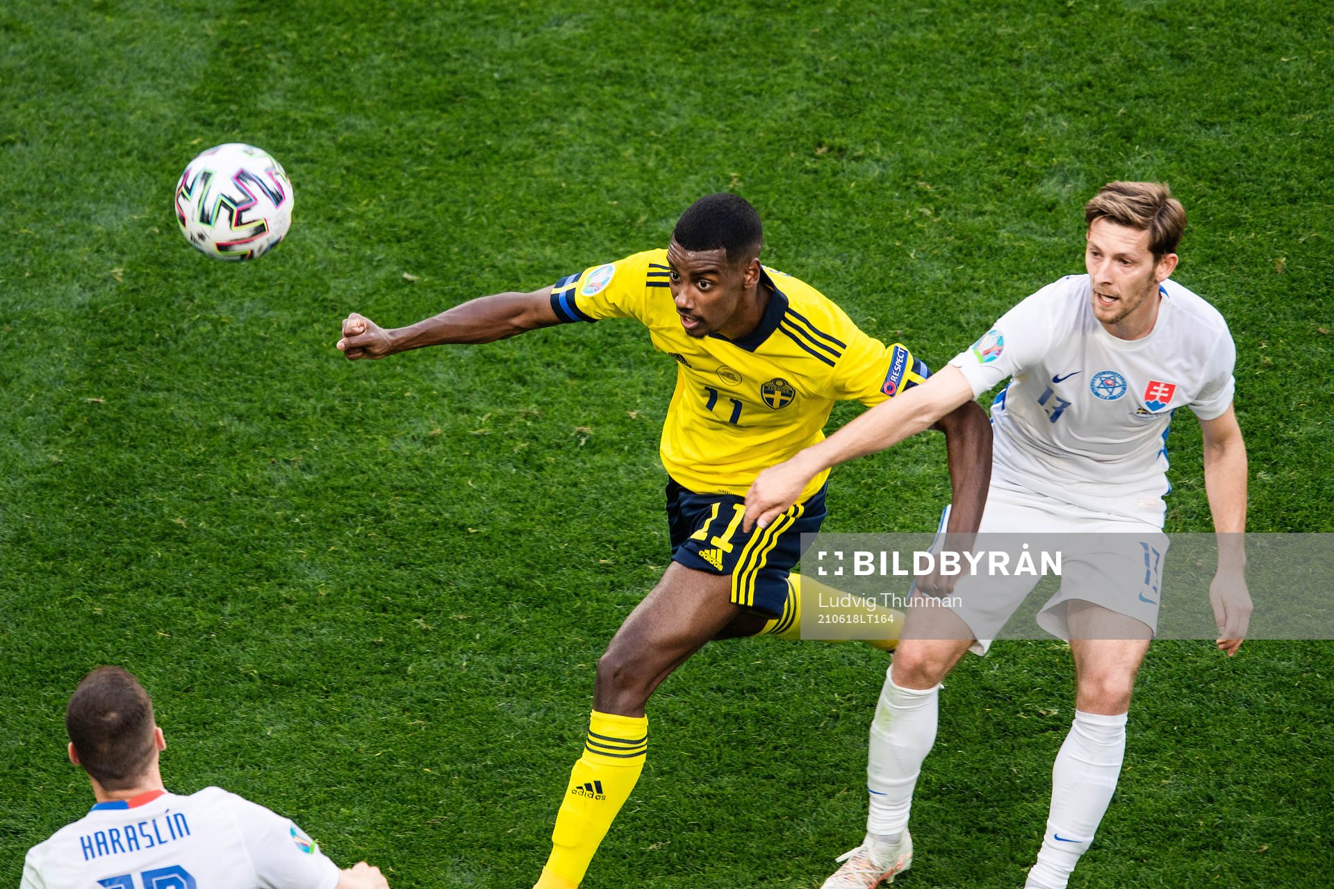Alexander Isak of Sweden and Patrik Hrosovsky of Slovakia