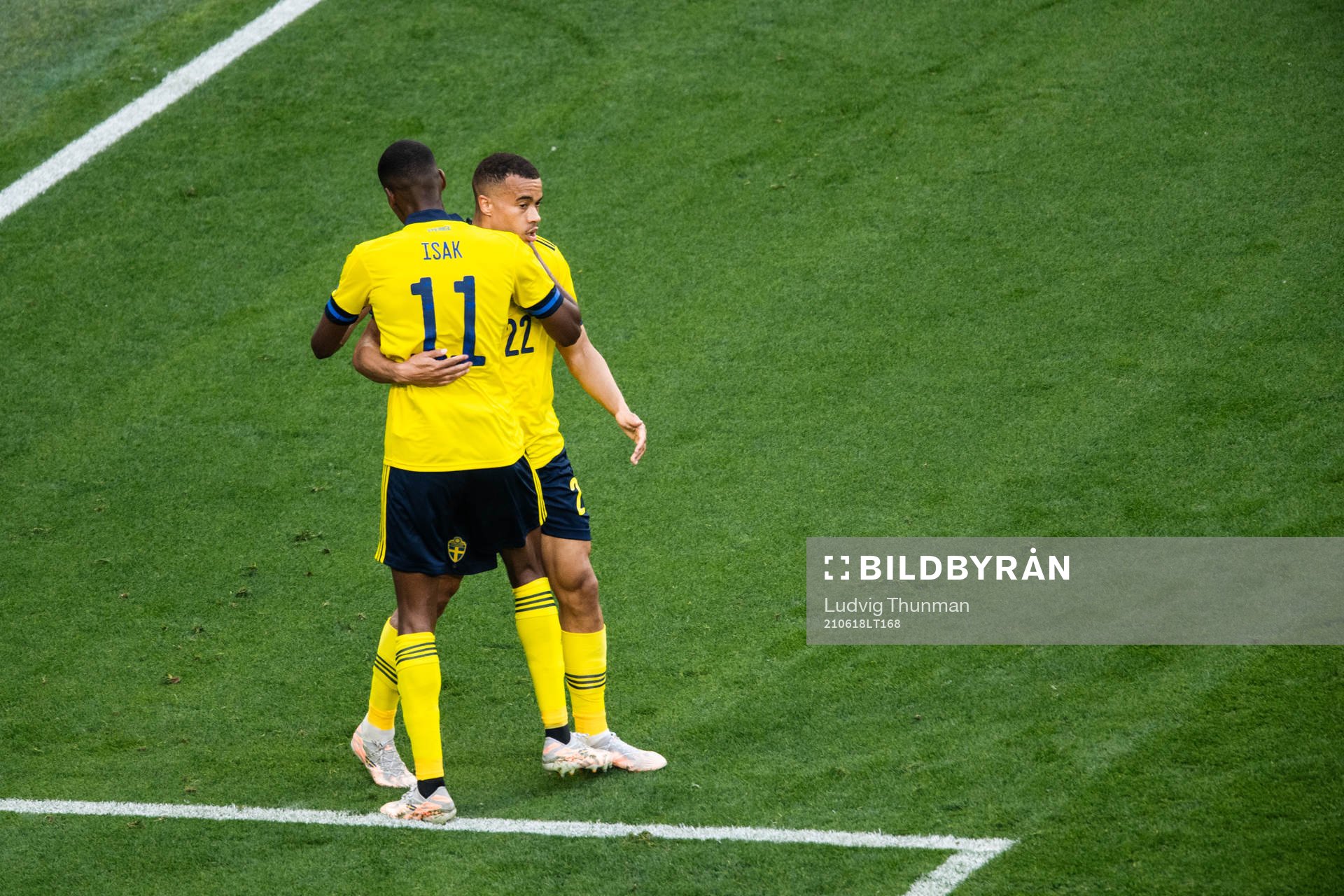 Robin Quaison and Alexander Isak of Sweden celebrate