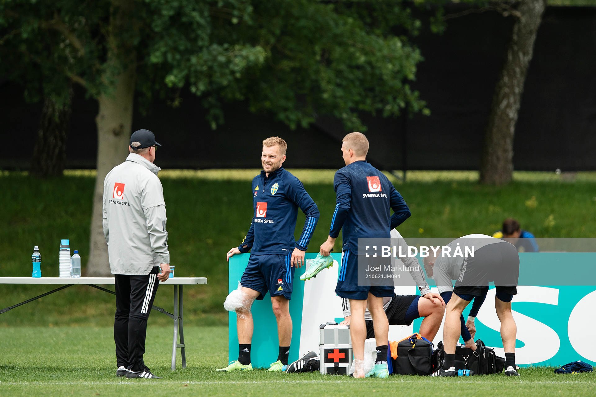 head coach Janne Andersson and Sebastian Larsson of the