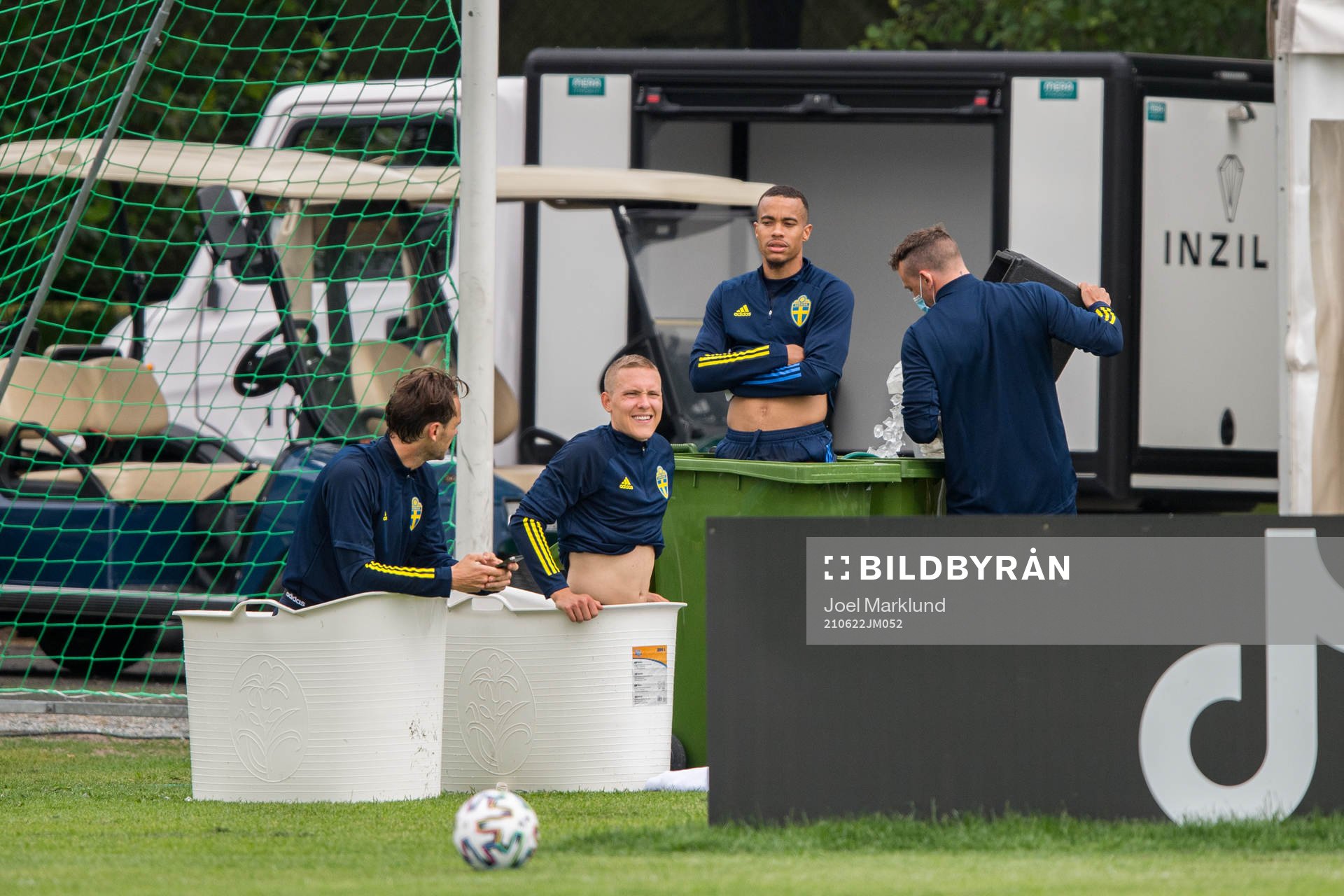Albin Ekdal, Ludwig Augustinsson and Robin Quaison of the Swedish national football team is taking an ice bath at a training session during the UEFA Euro 2020 Football Championship on June 22, 2021 in Gothenburg.