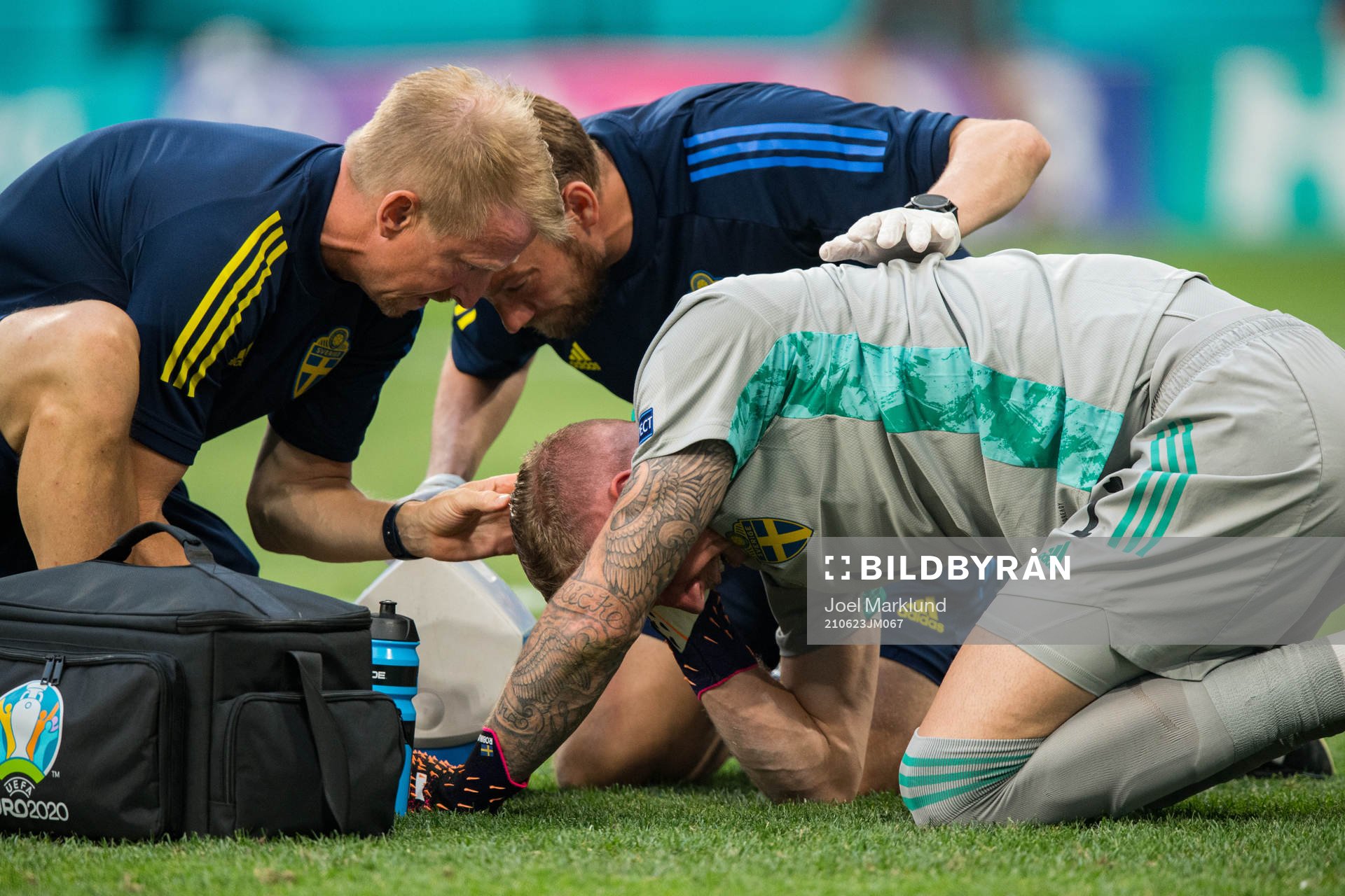 Goalkeeper Robin Olsen of Sweden in pain
