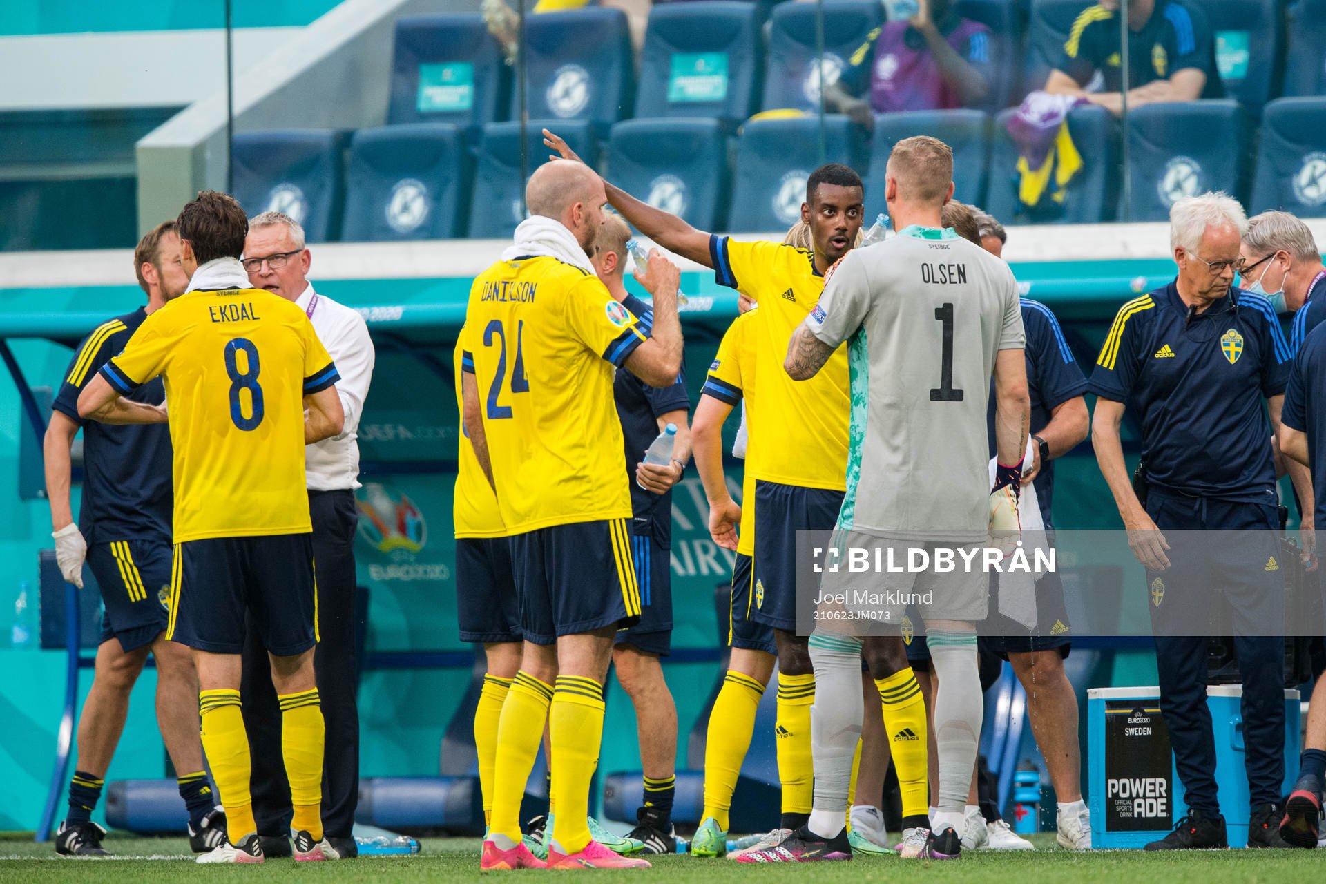 Alexander Isak and goalkeeper Robin Olsen of Sweden