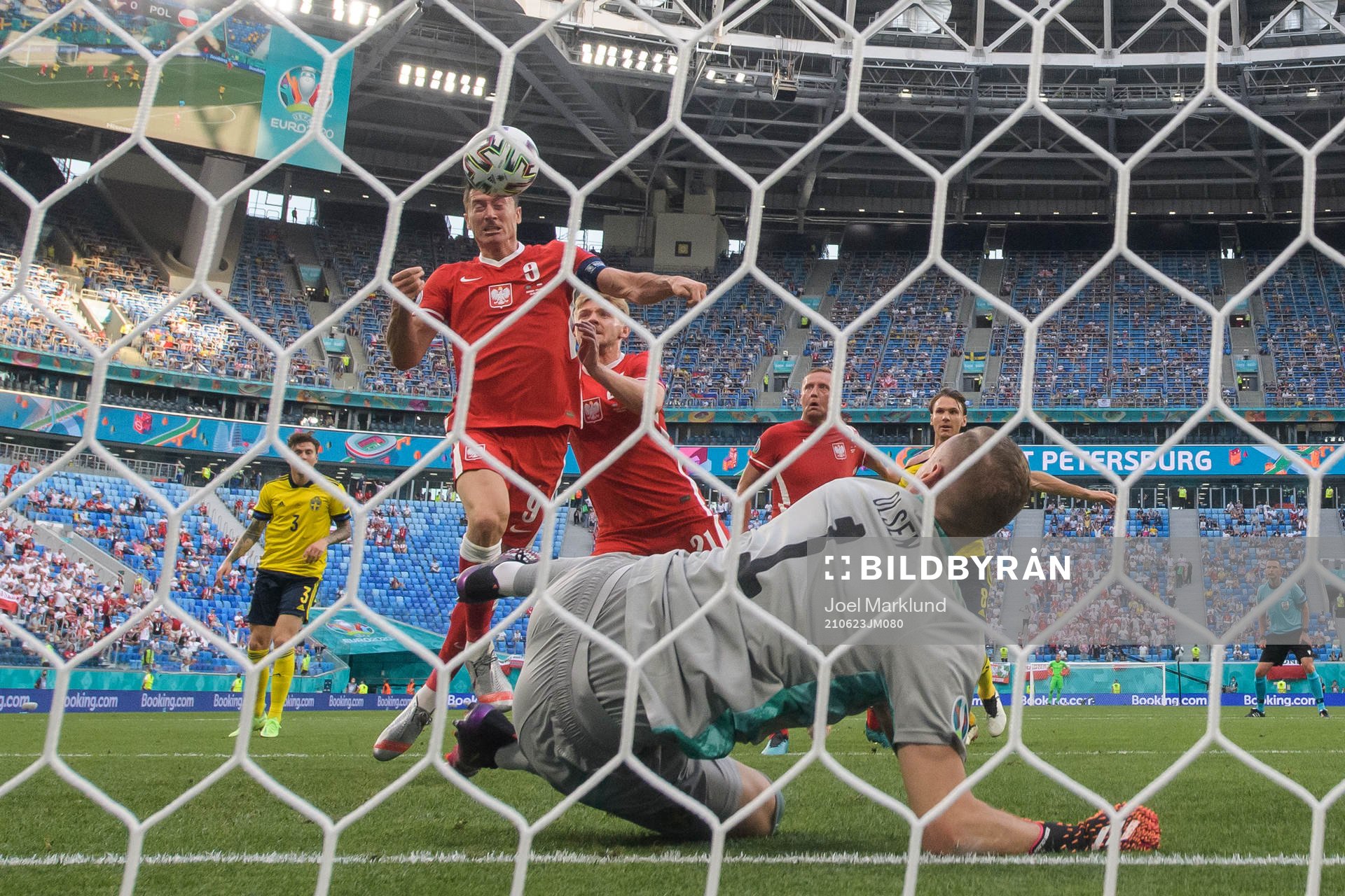 Robert Lewandowski of Poland with a header towards