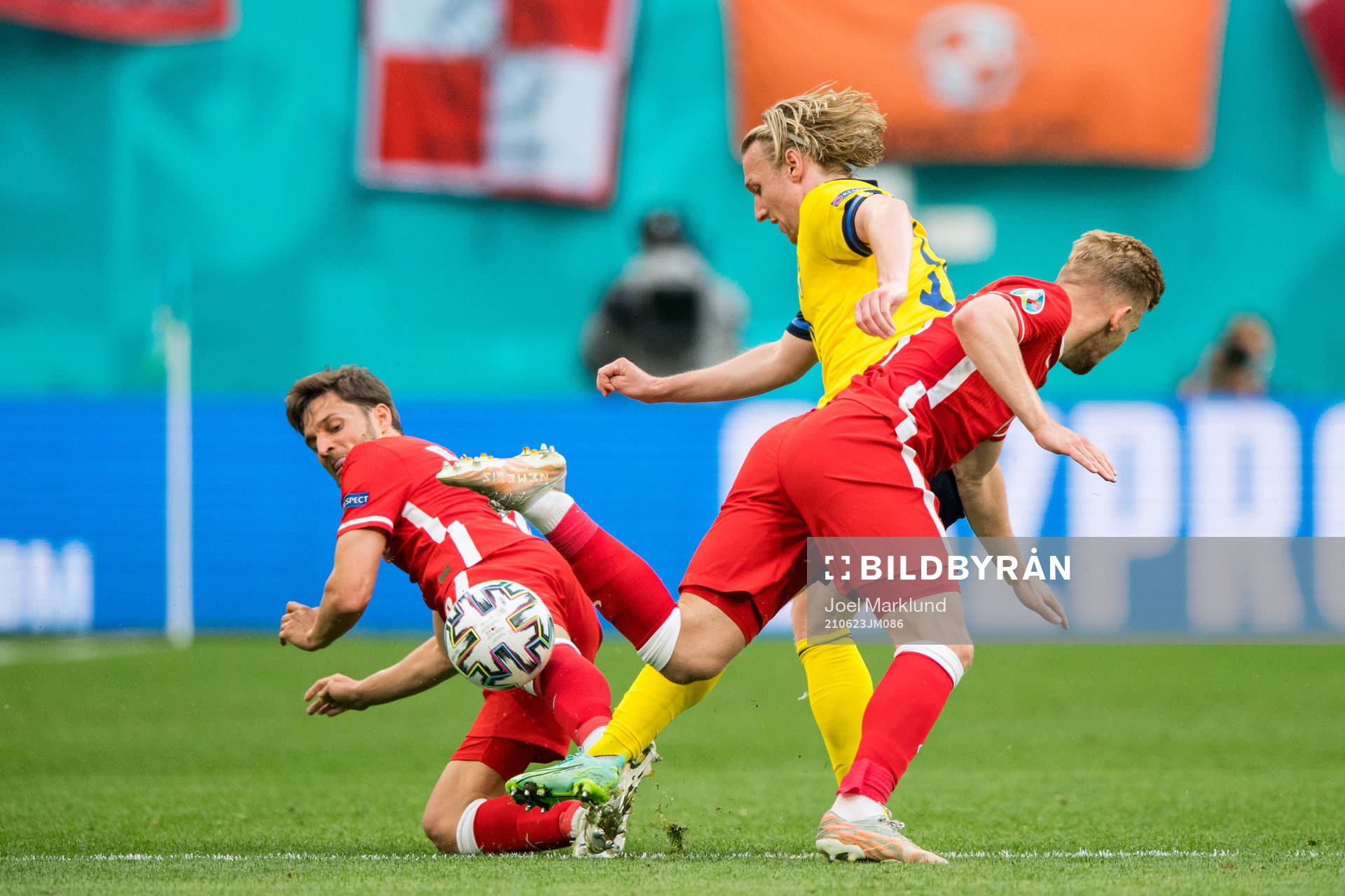 Kamil Jozwiak and Bartosz Bereszynski of Poland against Emil Forsberg of Sweden during the UEFA Euro 2020 Football Championship match between Sweden and Poland on June 23, 2021 in Saint Petersburg.