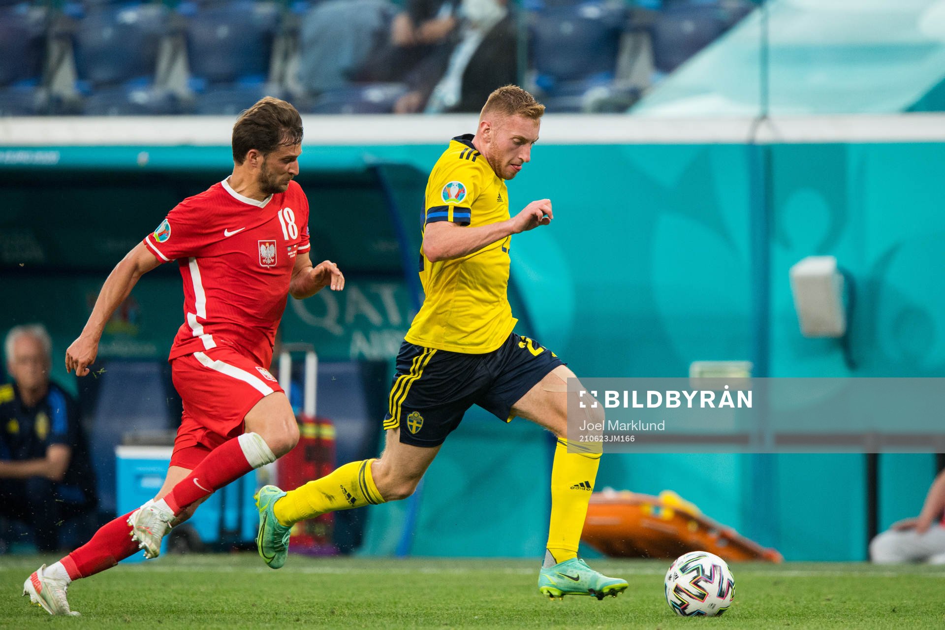 Bartosz Bereszynski of Poland and Dejan Kulusevski of Sweden
