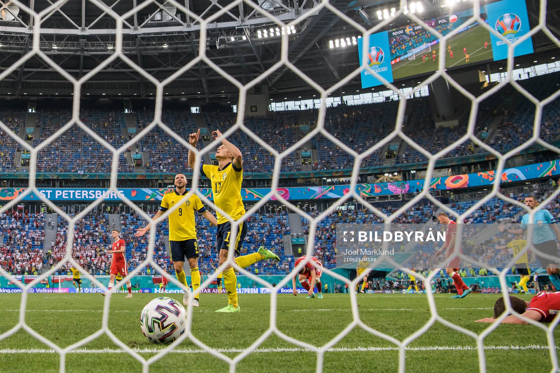 Marcus Berg and Viktor Claesson of Sweden celebrate the 3-2