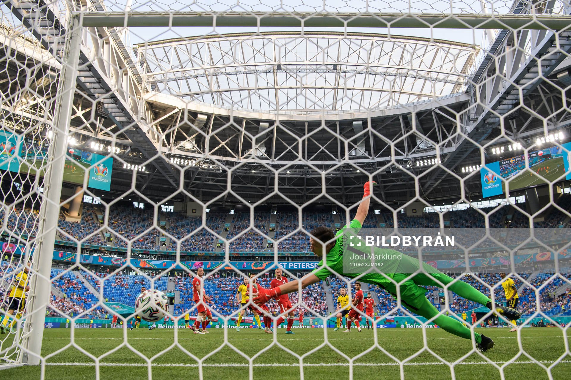 Goalkeeper Wojciech Szczesny of Poland lets in the 2-0 goal