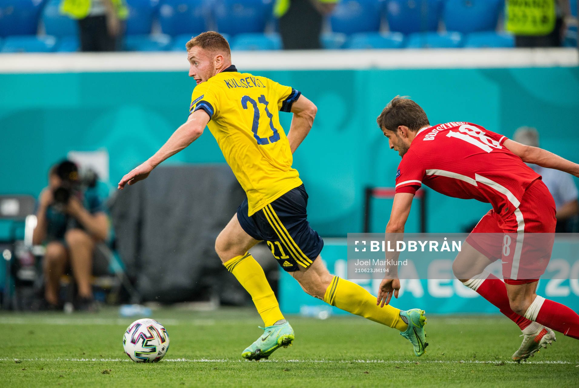 Dejan Kulusevski of Sweden and Bartosz Bereszynski of Poland