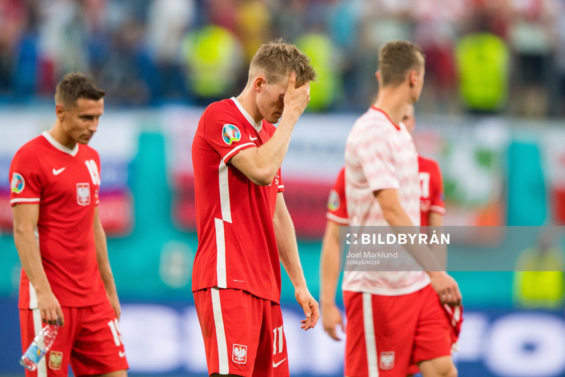 Karol Swiderski of Poland looks dejected