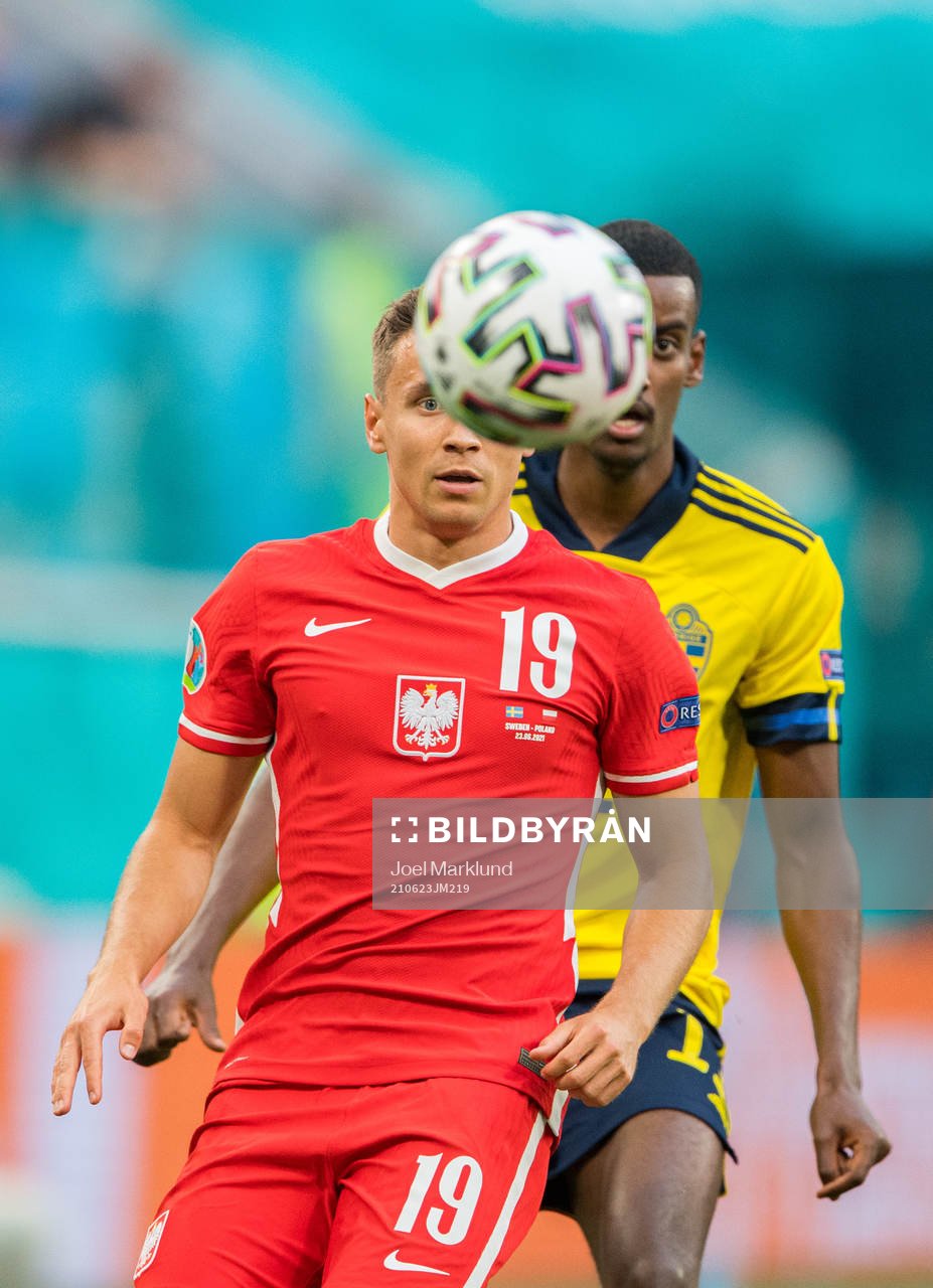 Przemyslaw Frankowski of Poland and Alexander Isak of Sweden