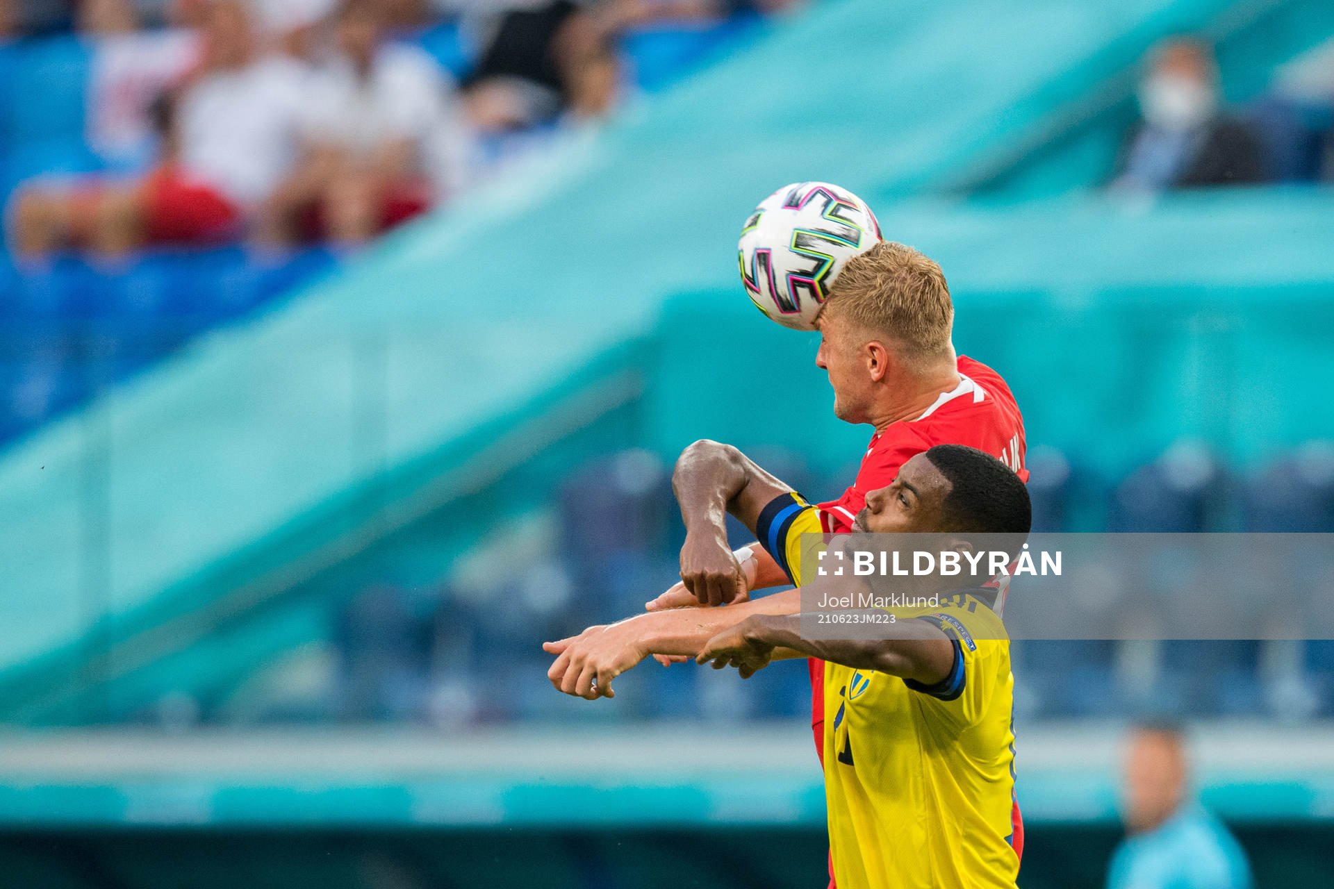 Kamil Glik of Poland and Alexander Isak of Sweden