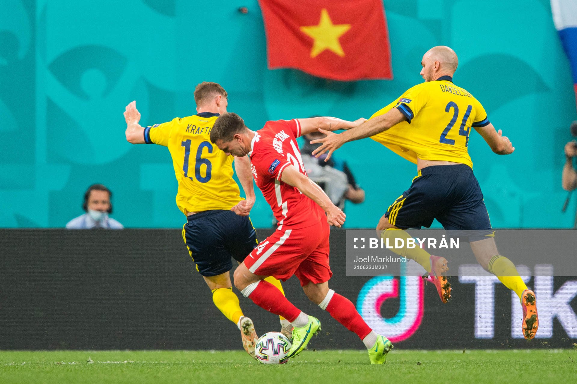 Jakub Swierczok of Poland against Emil Krafth and Marcus