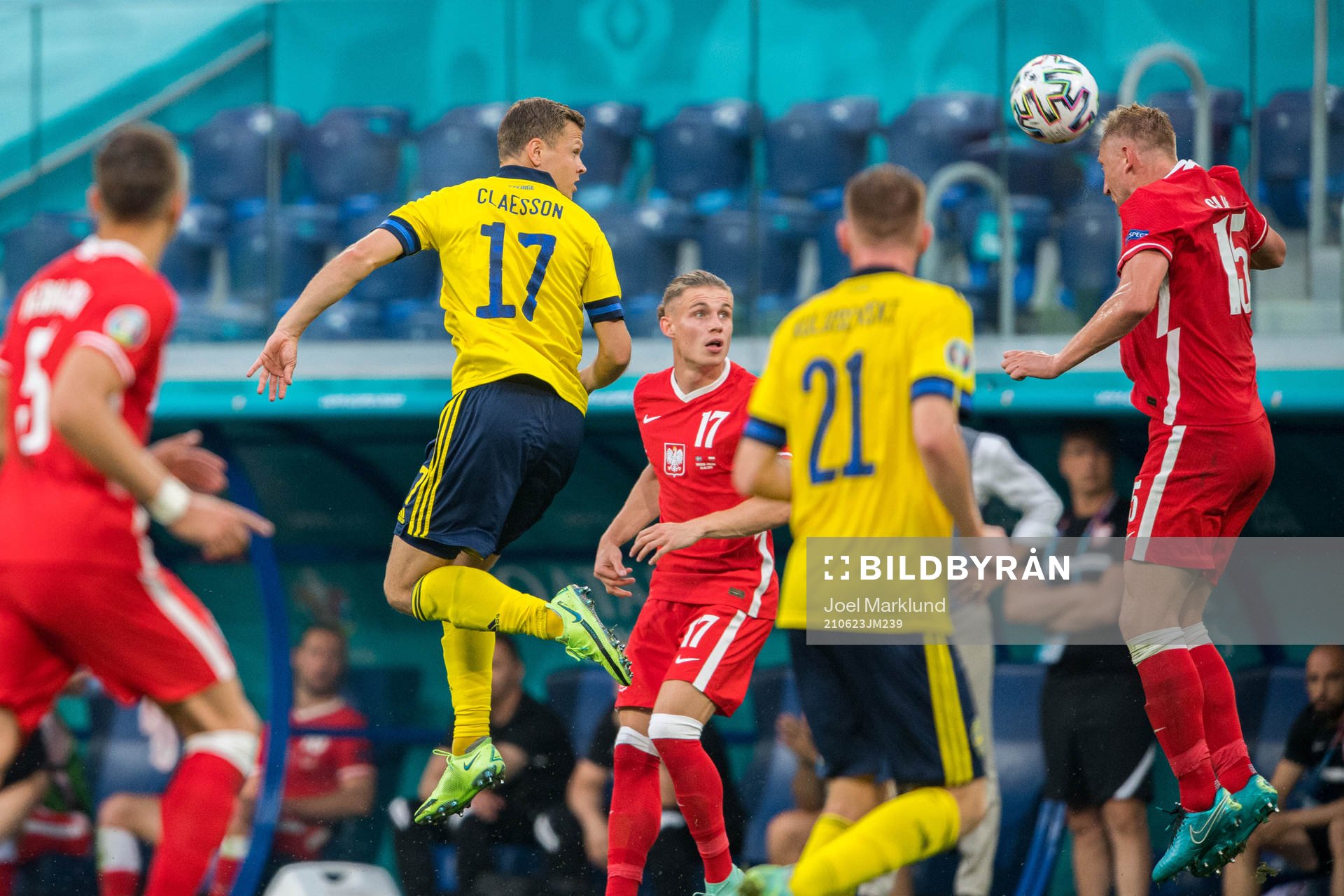 Viktor Claesson of Sweden and Kamil Glik of Poland