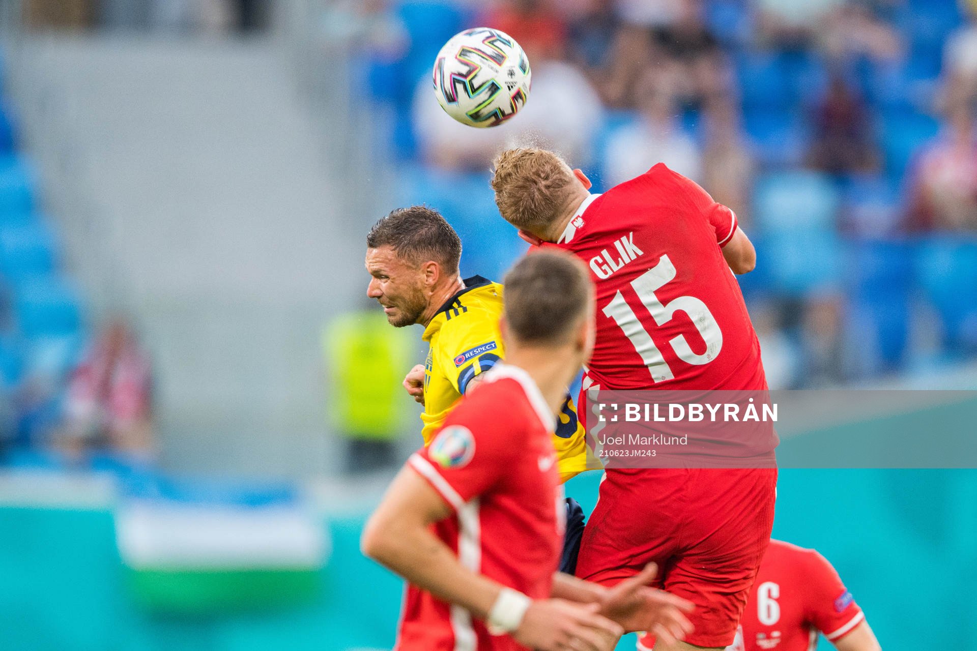 Marcus Berg of Sweden and Kamil Glik of Poland