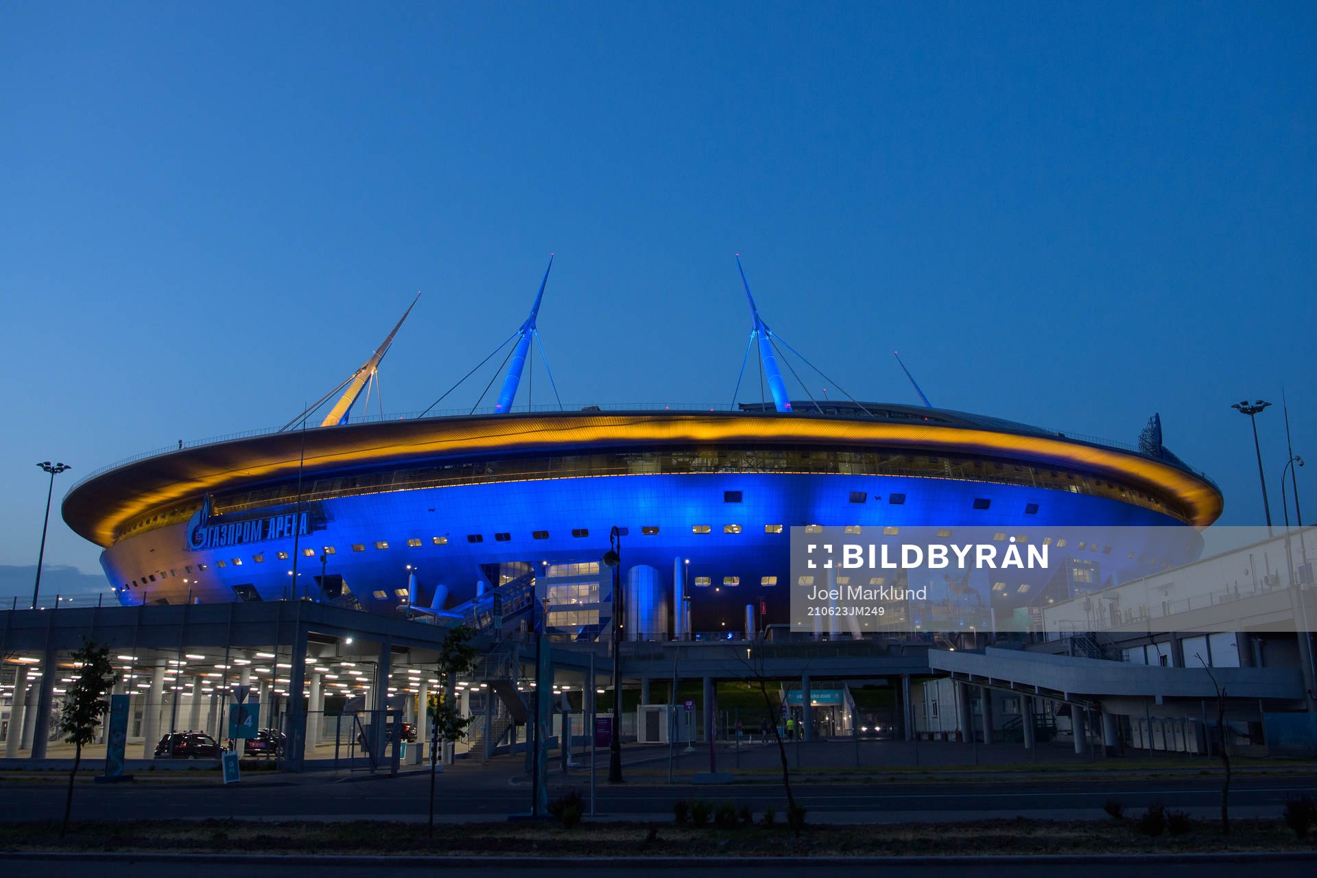 Saint Petersburg Stadium is lighted up in yellow and blue